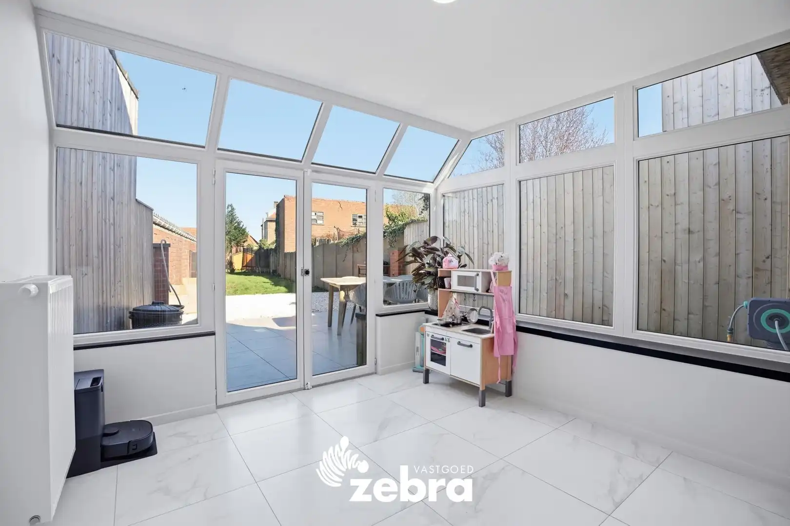 Ruime energiezuinige gezinswoning met tuin op centrale ligging! foto 11