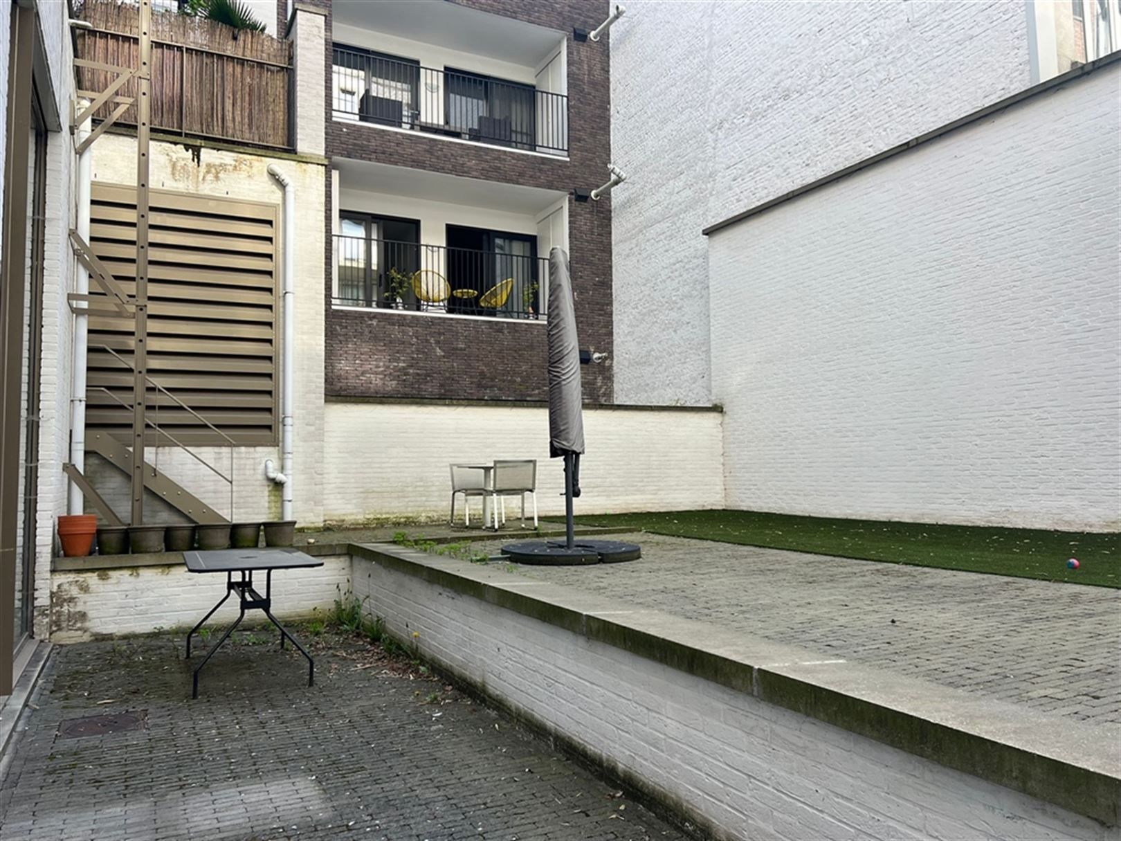 Geliijkvloerse kantoorruimte met hoge plafonds op het Eilandje foto 10