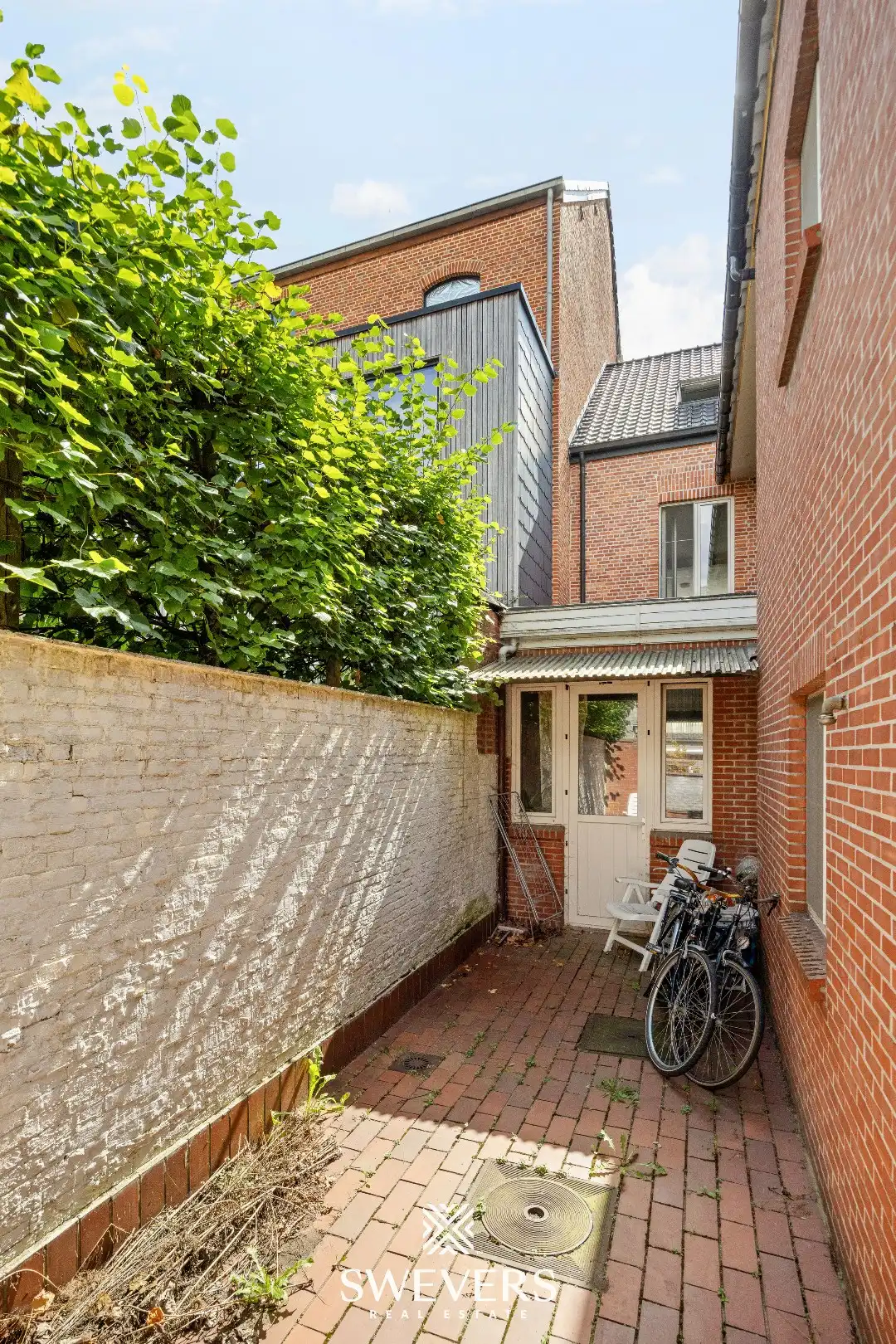 Gerenoveerd investeringspand met 2 verhuurde appartementen te Leopoldsburg foto 14