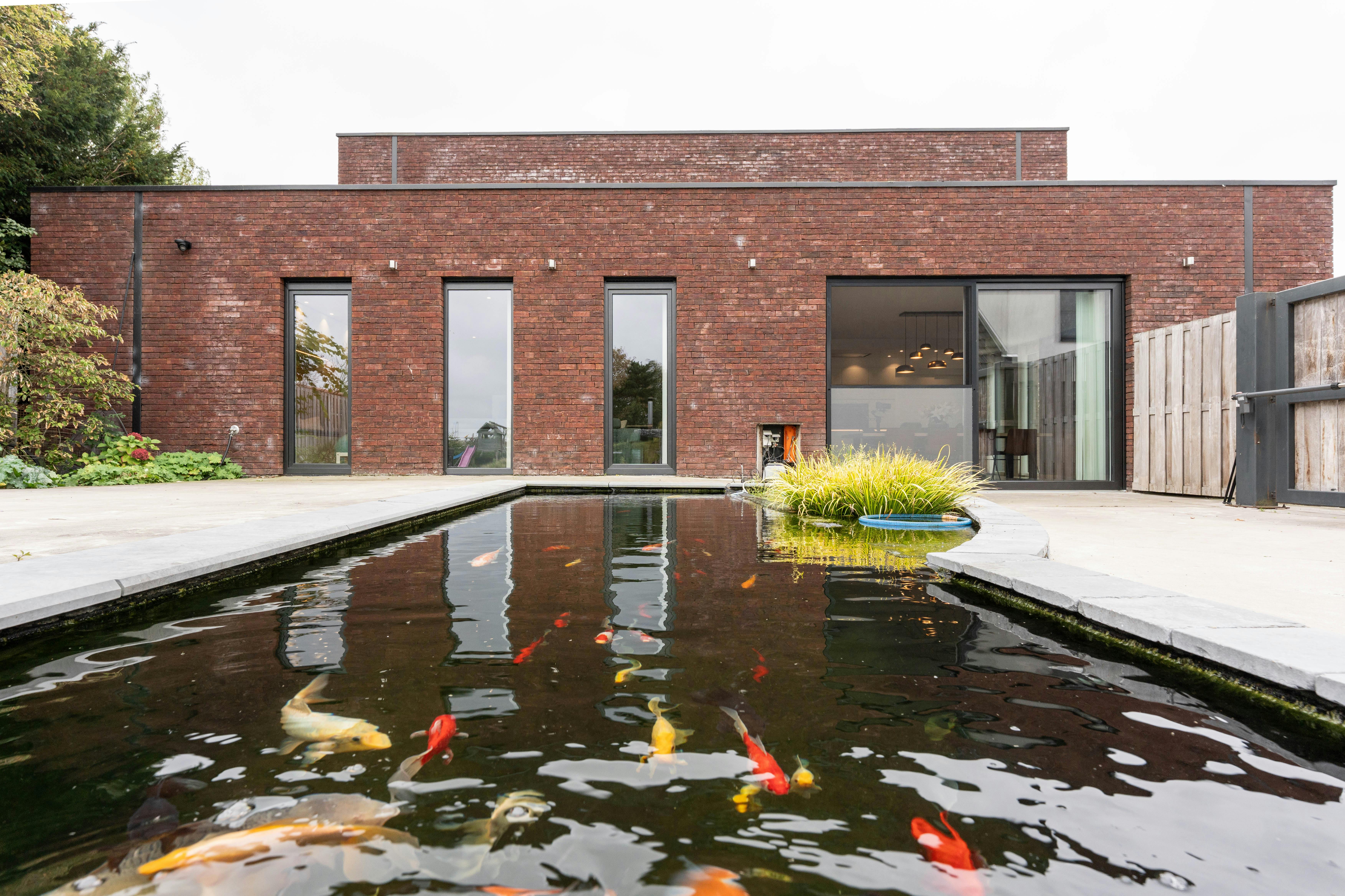 Moderne villa met zwembad en atelier te koop in Evergem foto 9