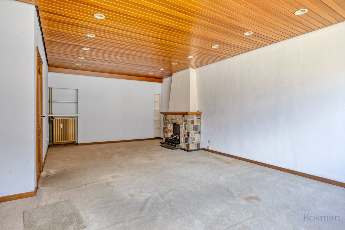 Halfopen bebouwing met 5 garageboxen te koop in Ham foto 4