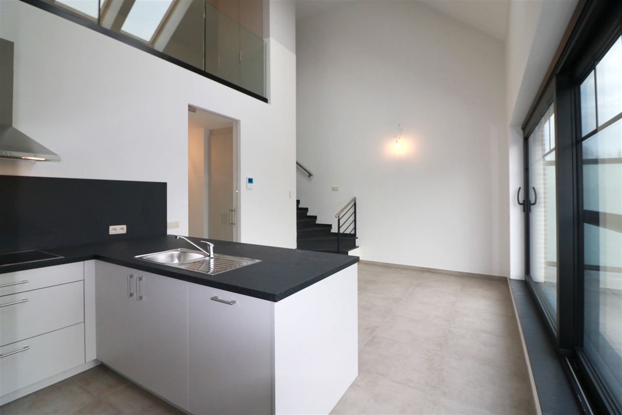 Unieke duplex met twee slpk, terras, autostaanplaats, label A foto 11