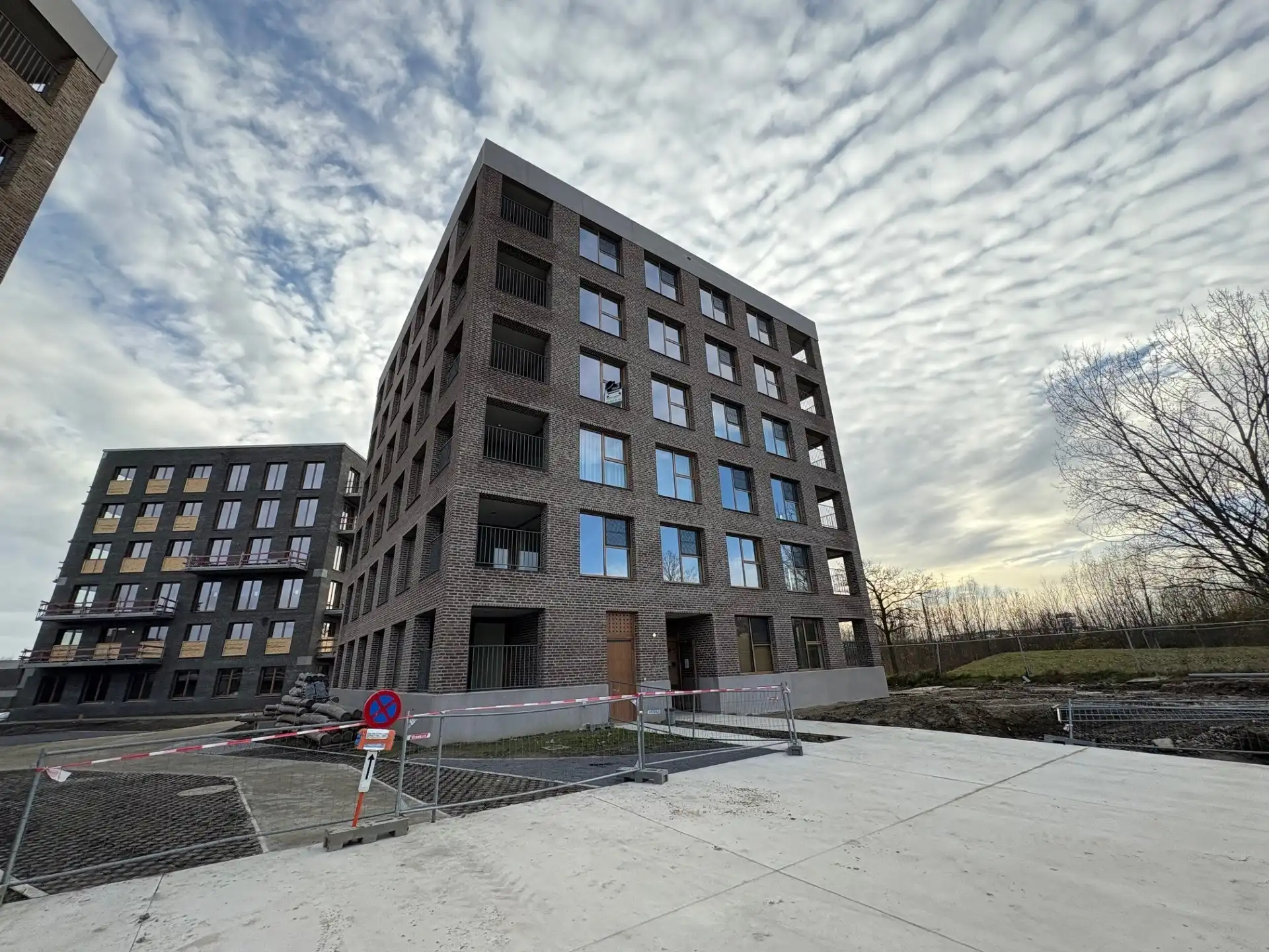 Te huur: Modern 1-slaapkamer appartement in nieuwbouwproject Tuinen van Eden, Wilrijk foto {{pictureIndex}}