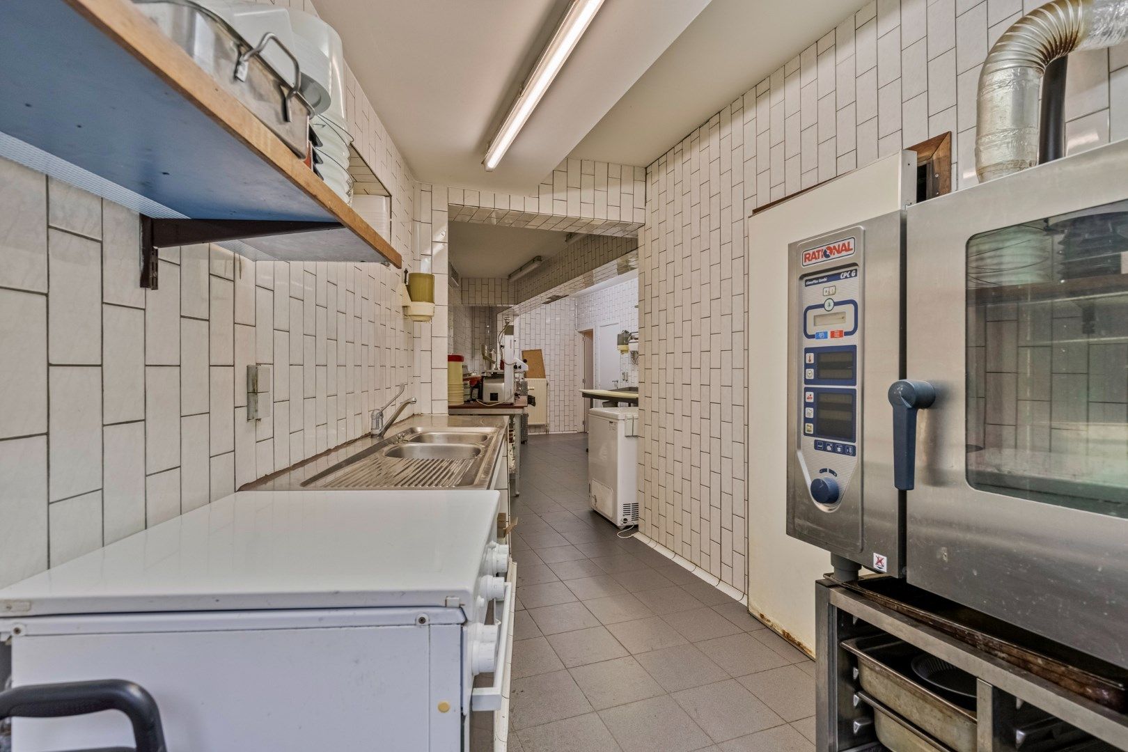 Ruime handelswoning met 6 SLPKS en garage in Mol-centrum ! foto 5