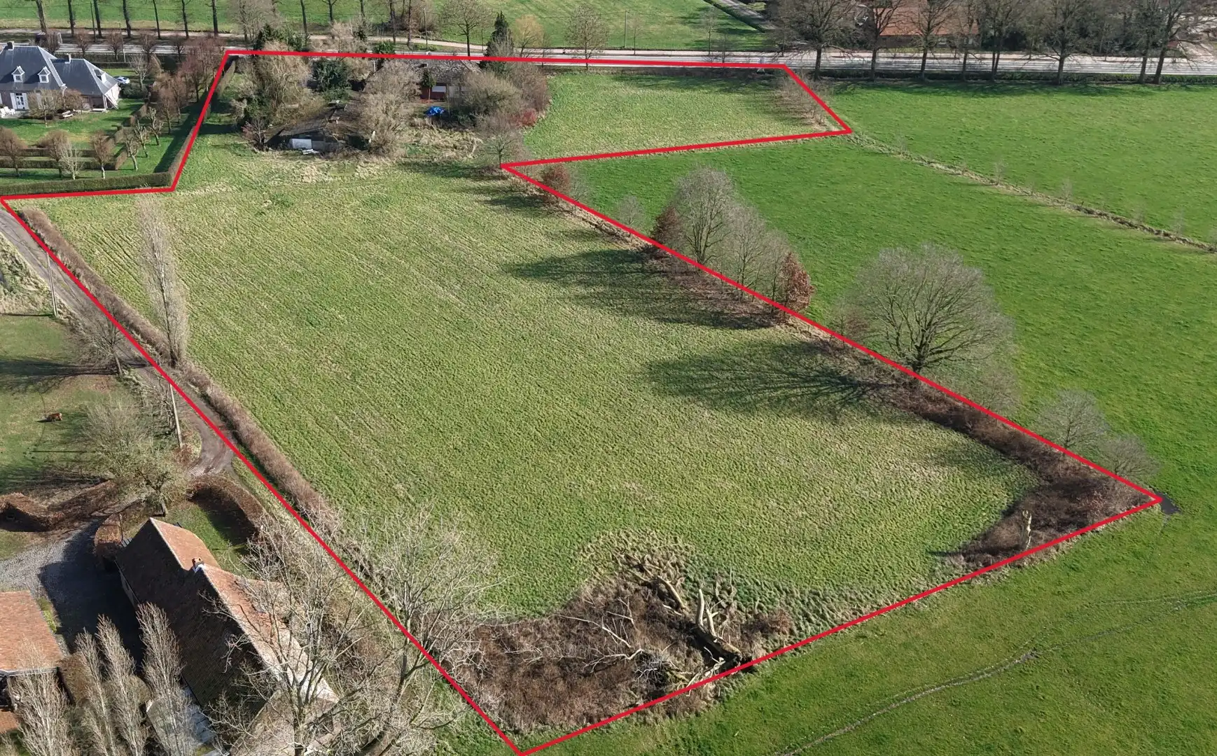 Unieke eigendom op 13.183 m² met te renoveren woning en vergunde stallingen foto 28
