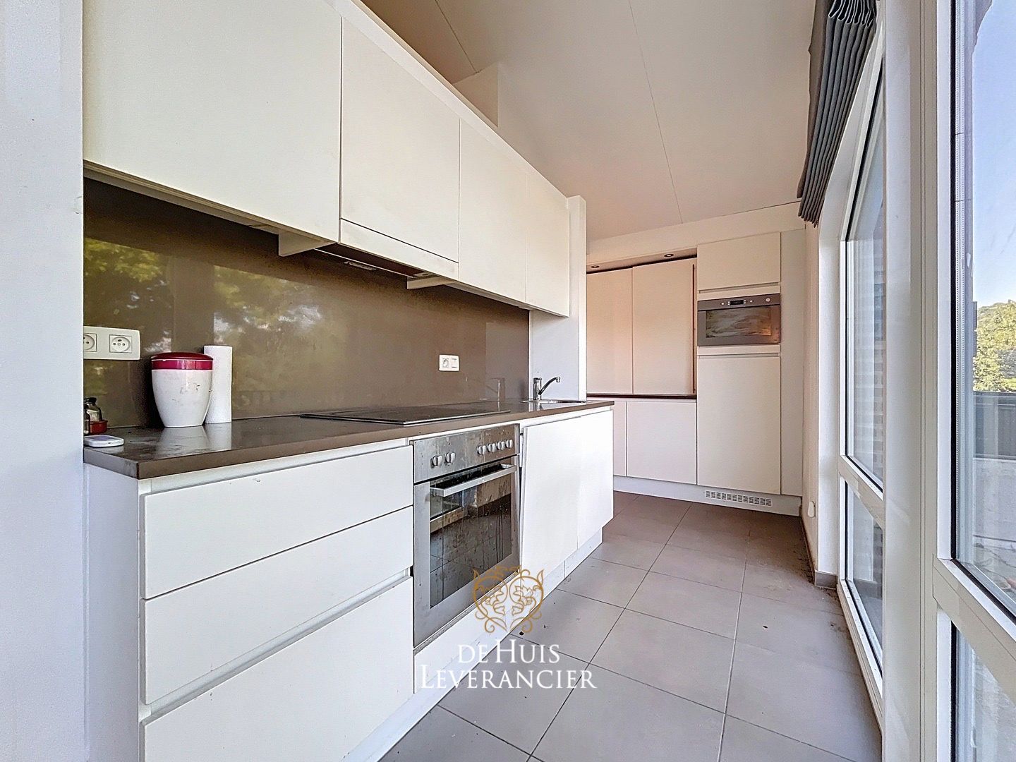 Luxueuze serviceflat met 1 slk en ruim terras foto 12