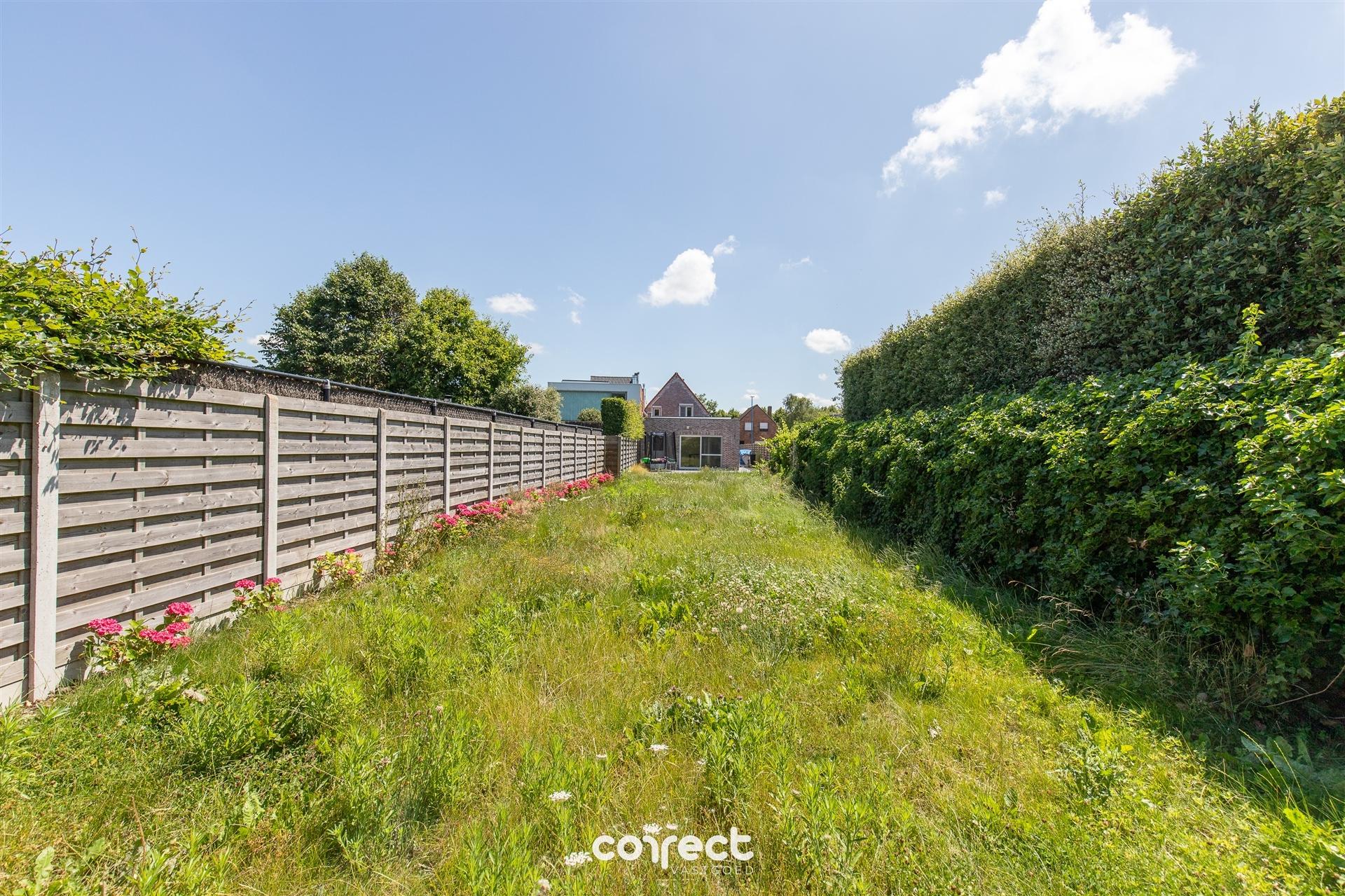 Modern halfopen woning te koop in hartje Oostduinkerke met 3 slaapkamers en diepe tuin foto 19