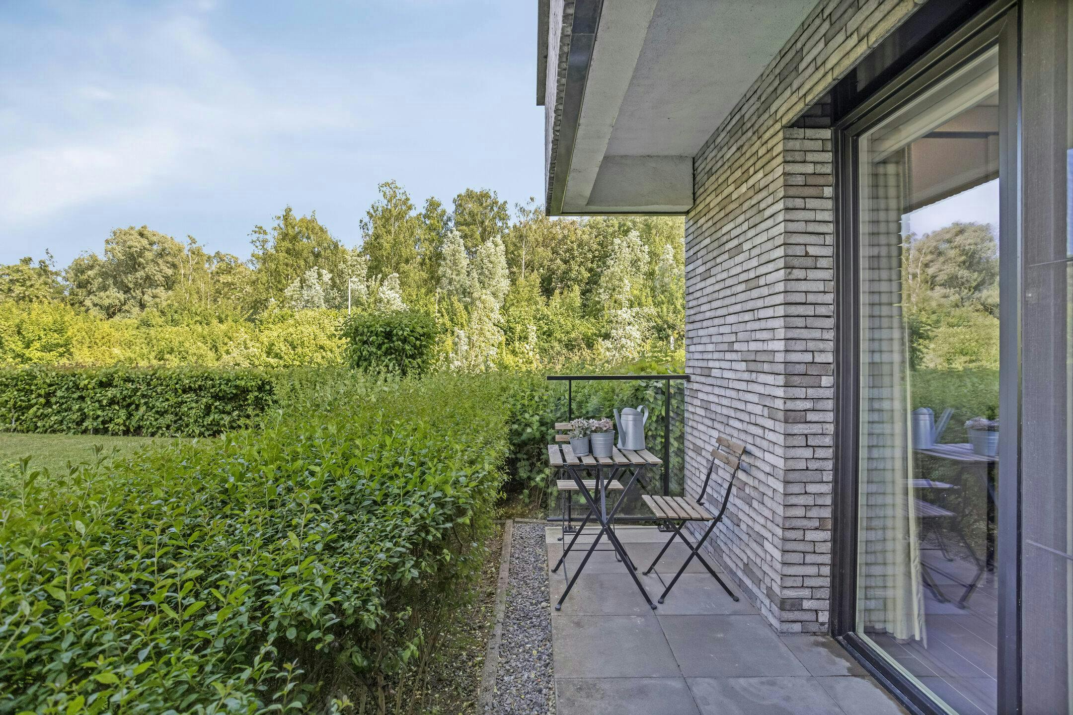 Energiezuinig gelijkvloers appartement met terras in Boom foto 12