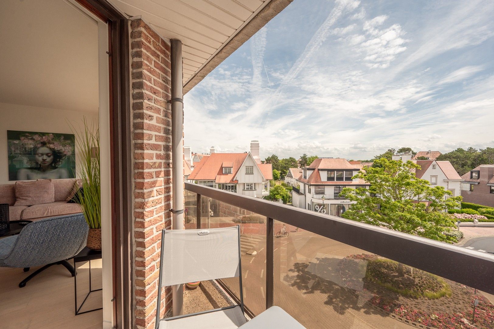 Hoekappartement met zuidwest oriëntatie en open zicht over het Driehoeksplein. foto 7