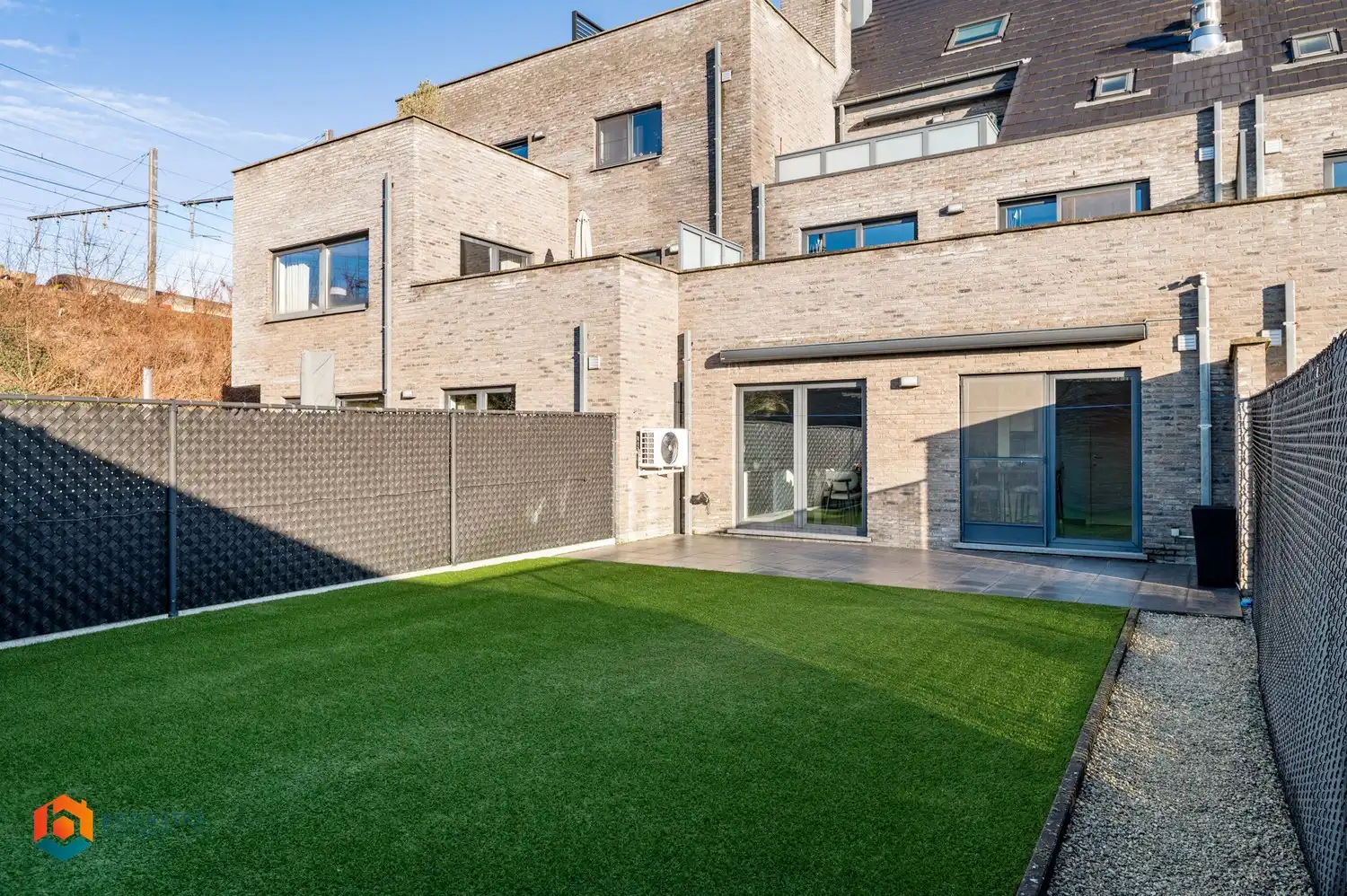 Instapklaar gelijkvloers appartement met 2slpkrs en tuin foto {{pictureIndex}}