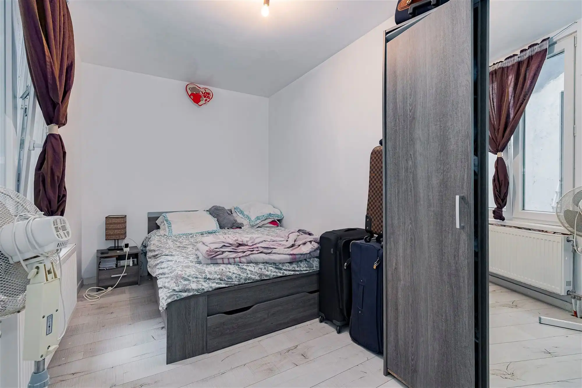 Woning opgedeeld in 4 verhuurde appartementen foto 6