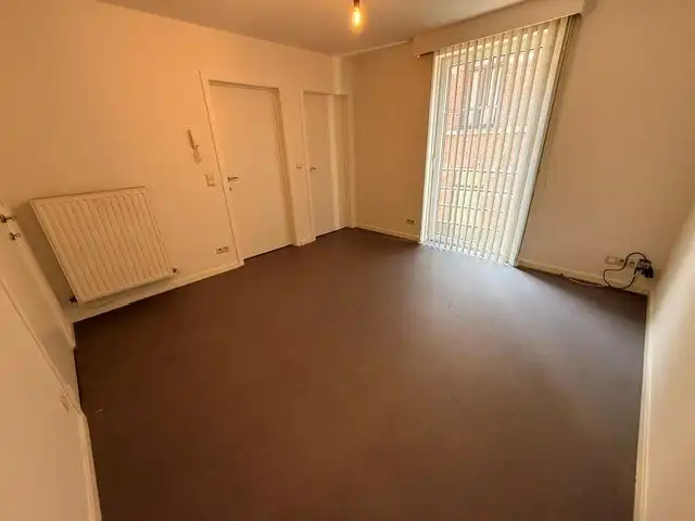 Verzorgd appartement met 1 slaapkamer, terras en lift in het centrum van Maaseik.  foto 8