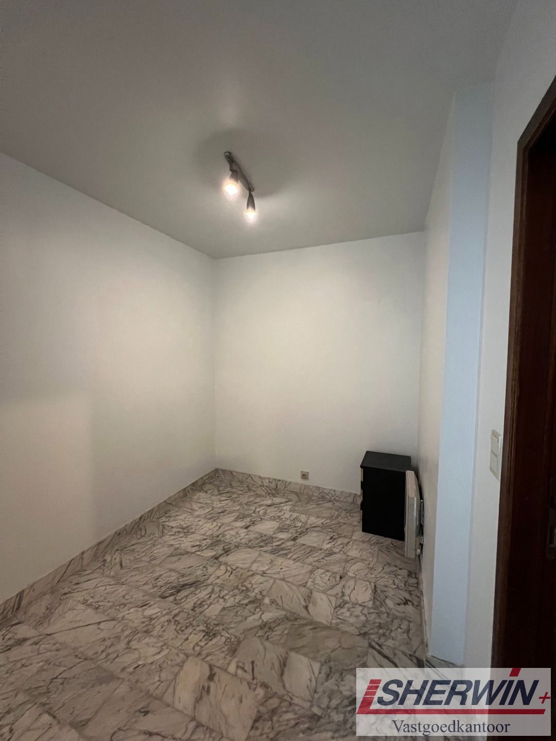 Deel van zeer goed gelegen appartementsgebouw in centrum foto 30