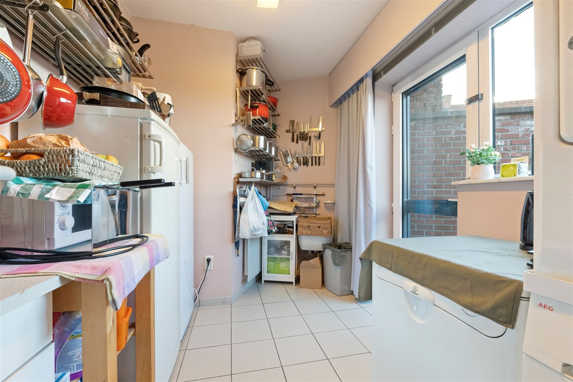 OPBRENGSTEIGENDOM MET HANDELSRUIMTE EN DUPLEX-APPARTEMENT IN SINT-TRUIDEN  foto 4