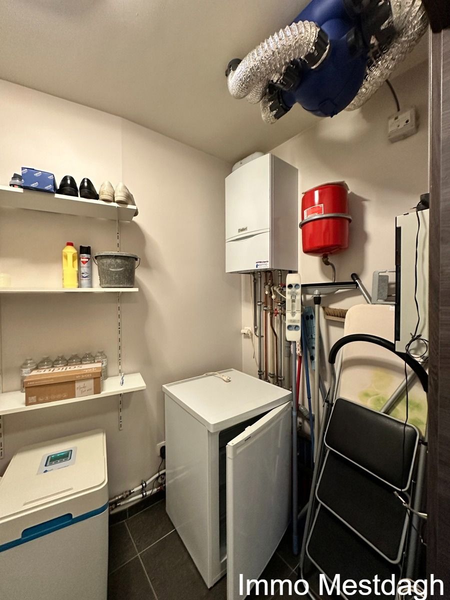 Ruim gelijkvloers appartement met tuin en autostaanplaats. foto 30