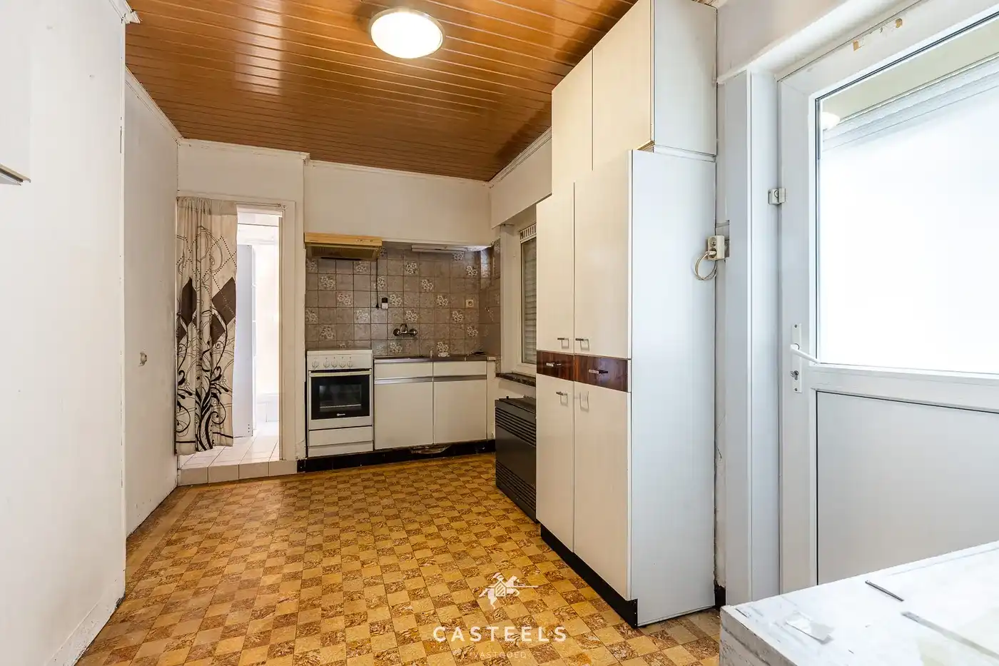 Te renoveren woning met ruime tuin in Merelbeke Flora foto 6