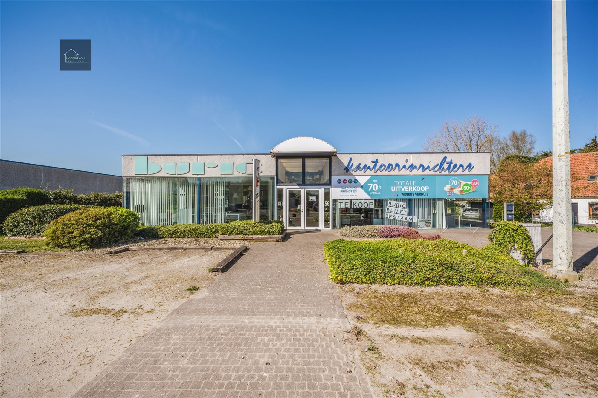  Multifunctioneel bedrijfsgebouw met toonzaal, magazijn, kantoren én woonst op toplocatie. foto 29