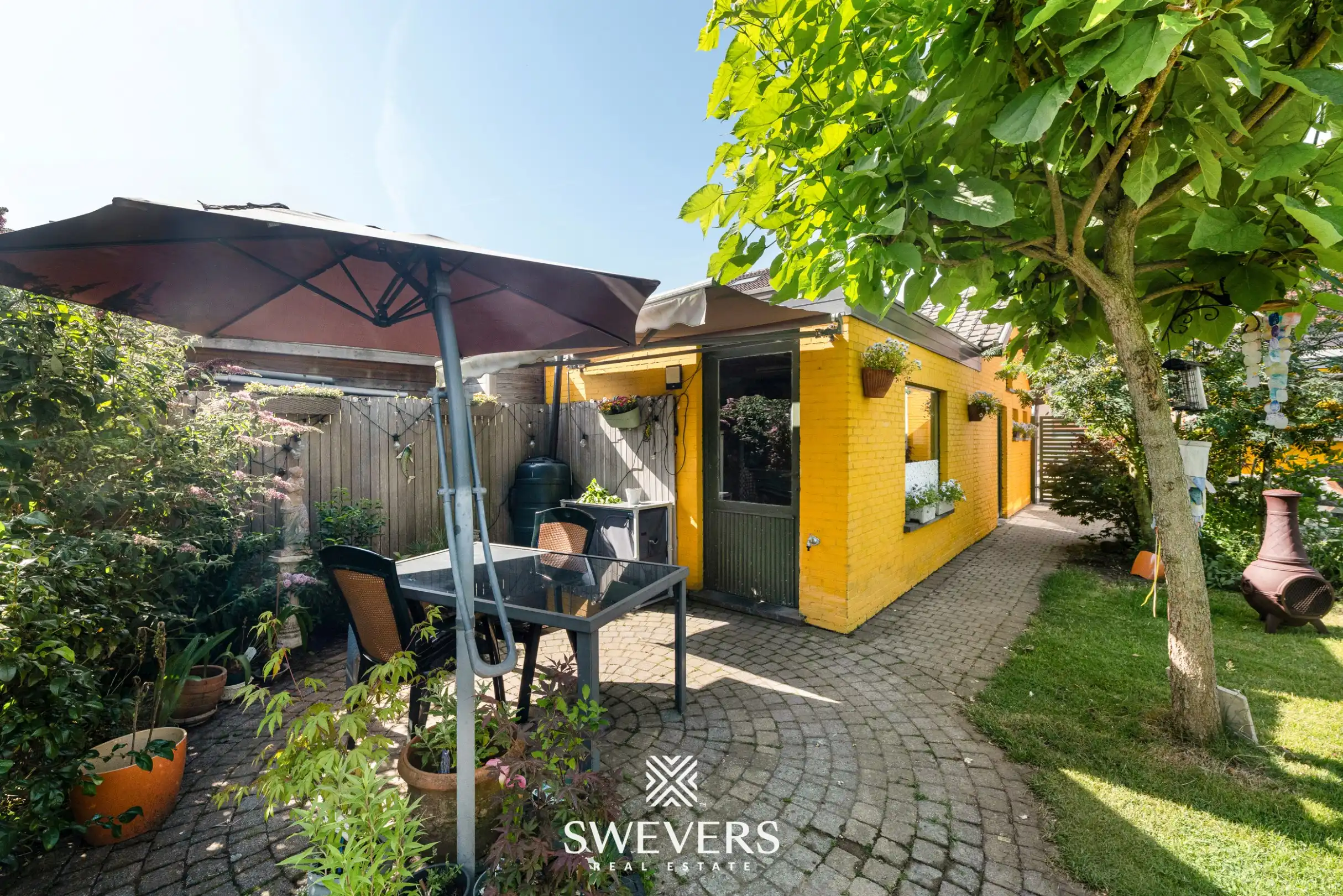 Instapklare halfopen bebouwing met 4 slaapkamers en een aangename tuin op topligging in Hasselt foto 21