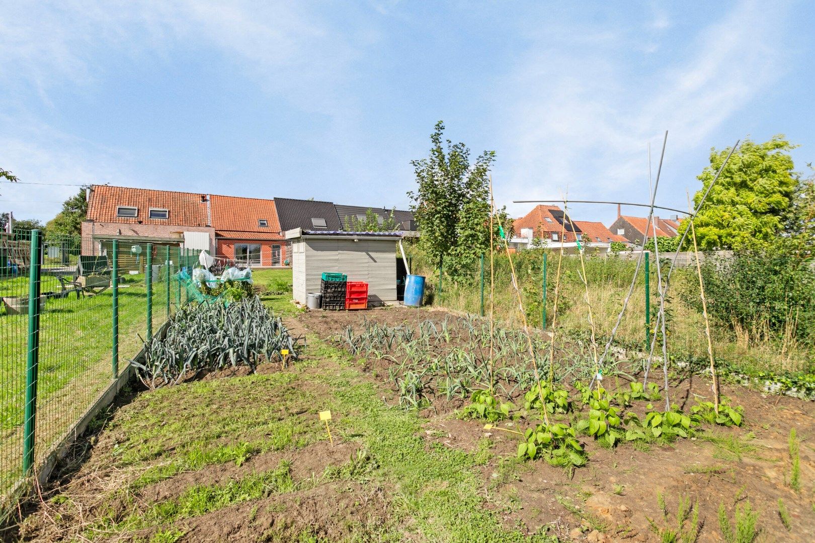 Instapklare woning met 2 slaapkamers en grote, zuidgerichte tuin! foto 16