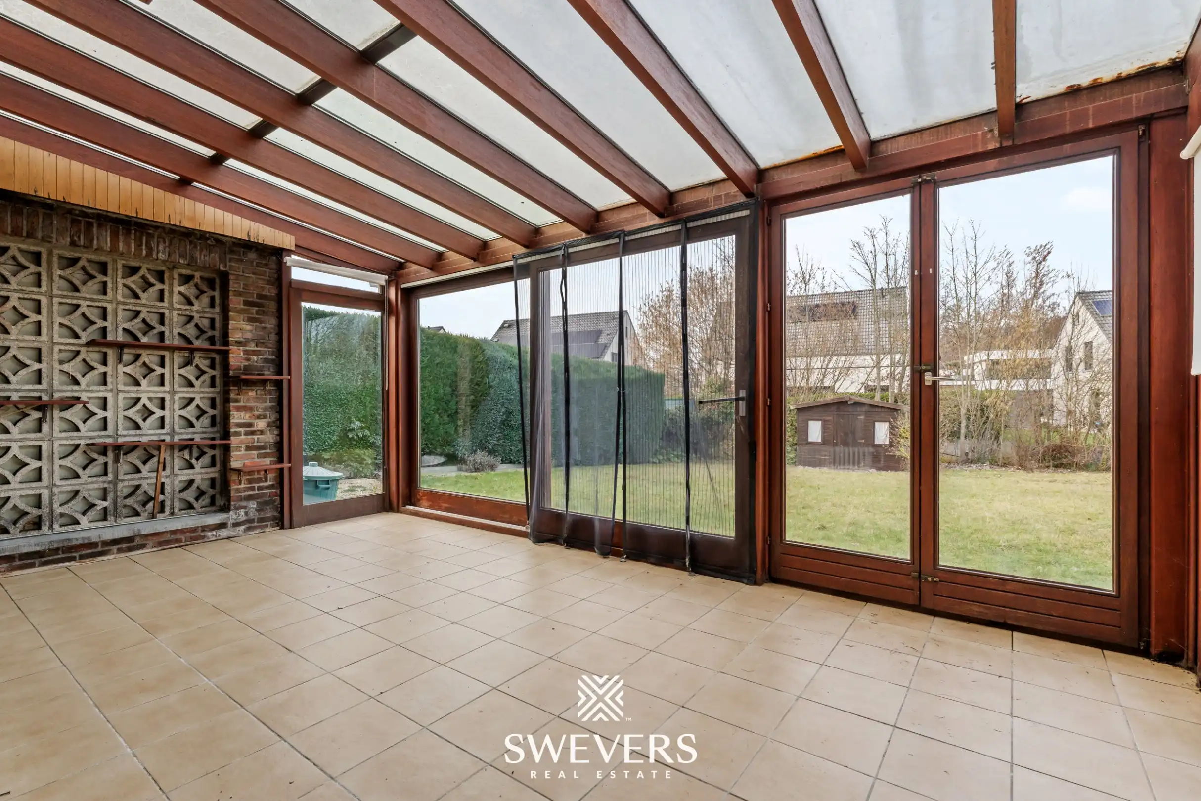 Ruime open bebouwing met inpandige garage en mooie tuin nabij het centrum van Hasselt foto 9