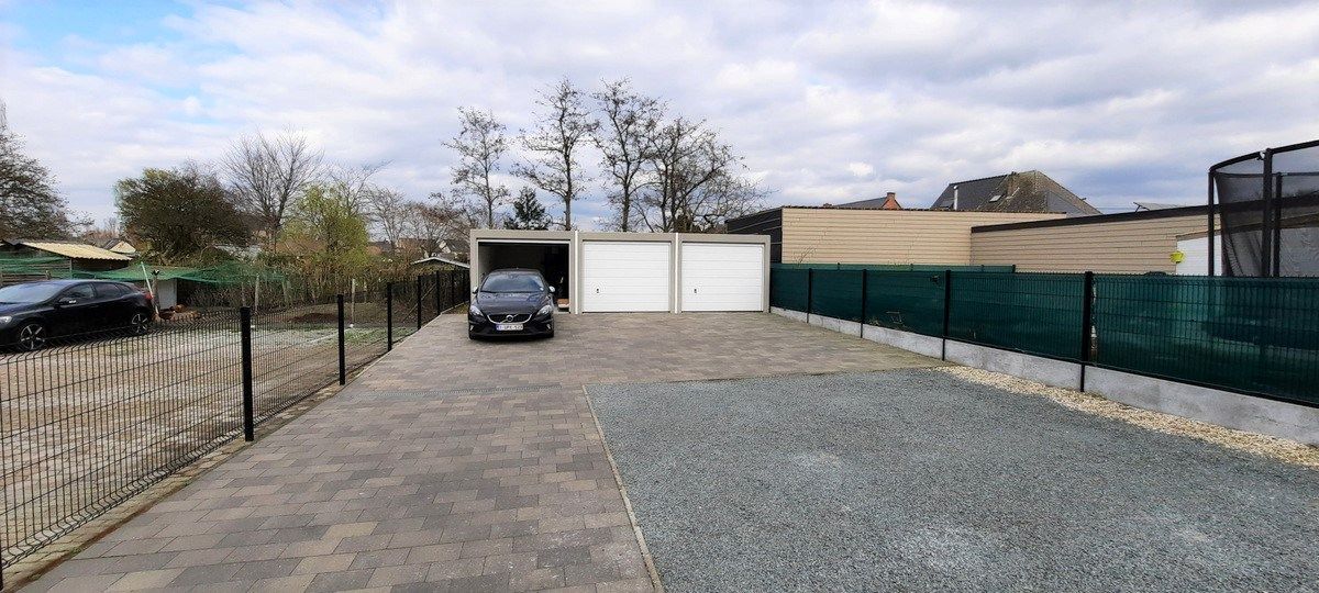 Gelijkvloers app met 1 slk, terras en tuintje, autostaanplaats én garage foto 13