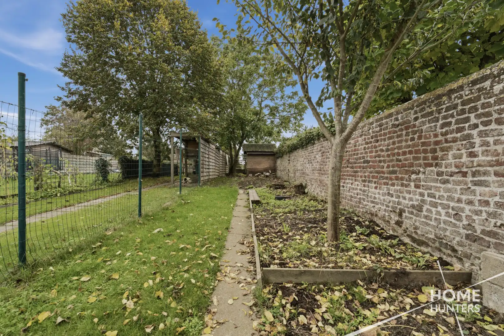 Charmante woning met zuidgerichte tuin in hartje Heuvelland foto 15