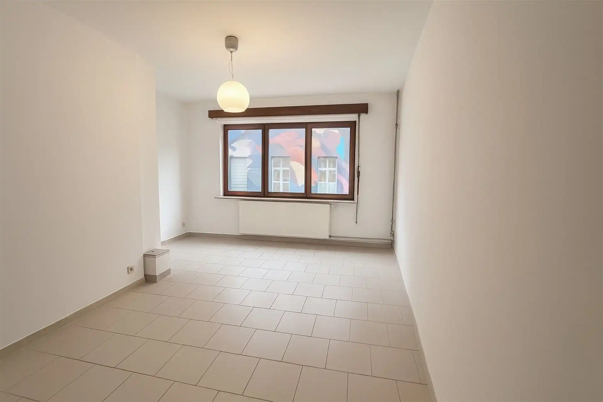 Centraal gelegen stadswoning met 2 slaapkamers, garage en terras foto 6
