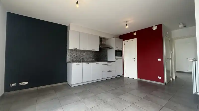 Instapklaar 2-slaapkamerappartement met TERRAS en AUTOSTANDPLAATS te huur in Torhout foto 3