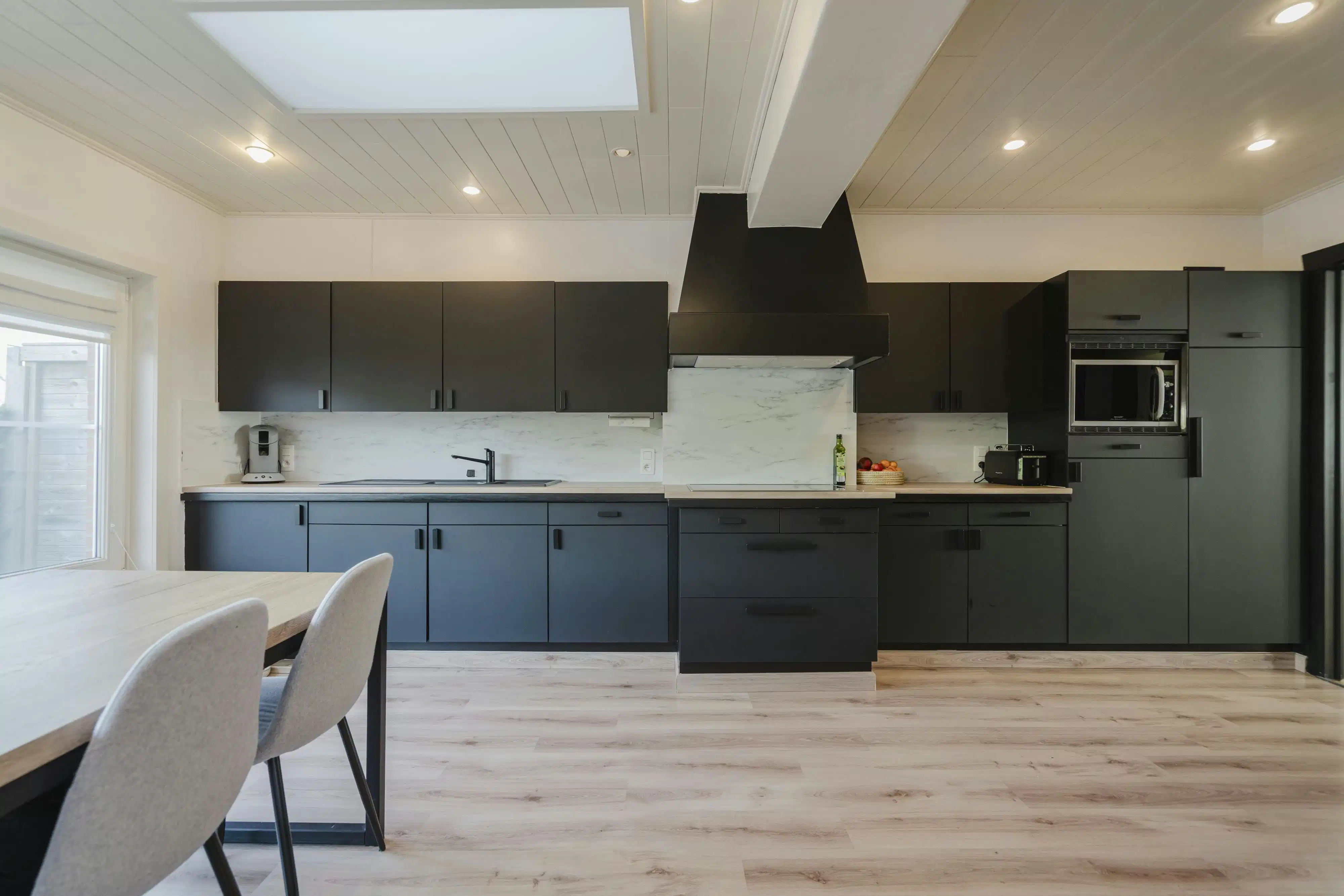 Halfopen gezinswoning met 3 slaapkamers nabij centrum Kortrijk foto 3