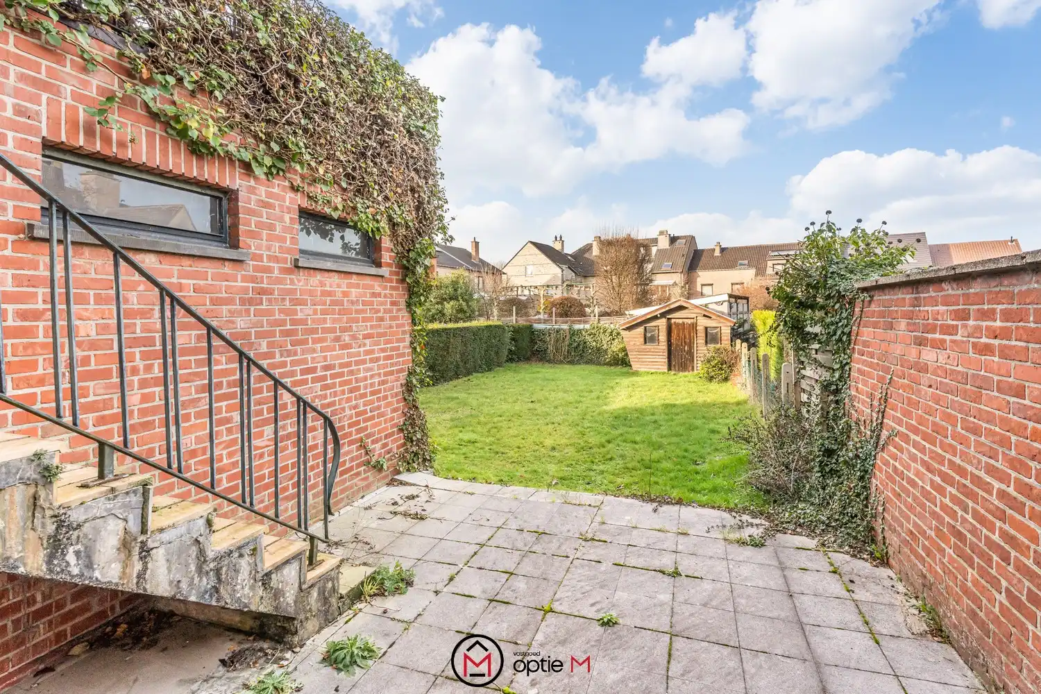 Karaktervolle woning met tuin te koop in centrum Bilzen foto 3