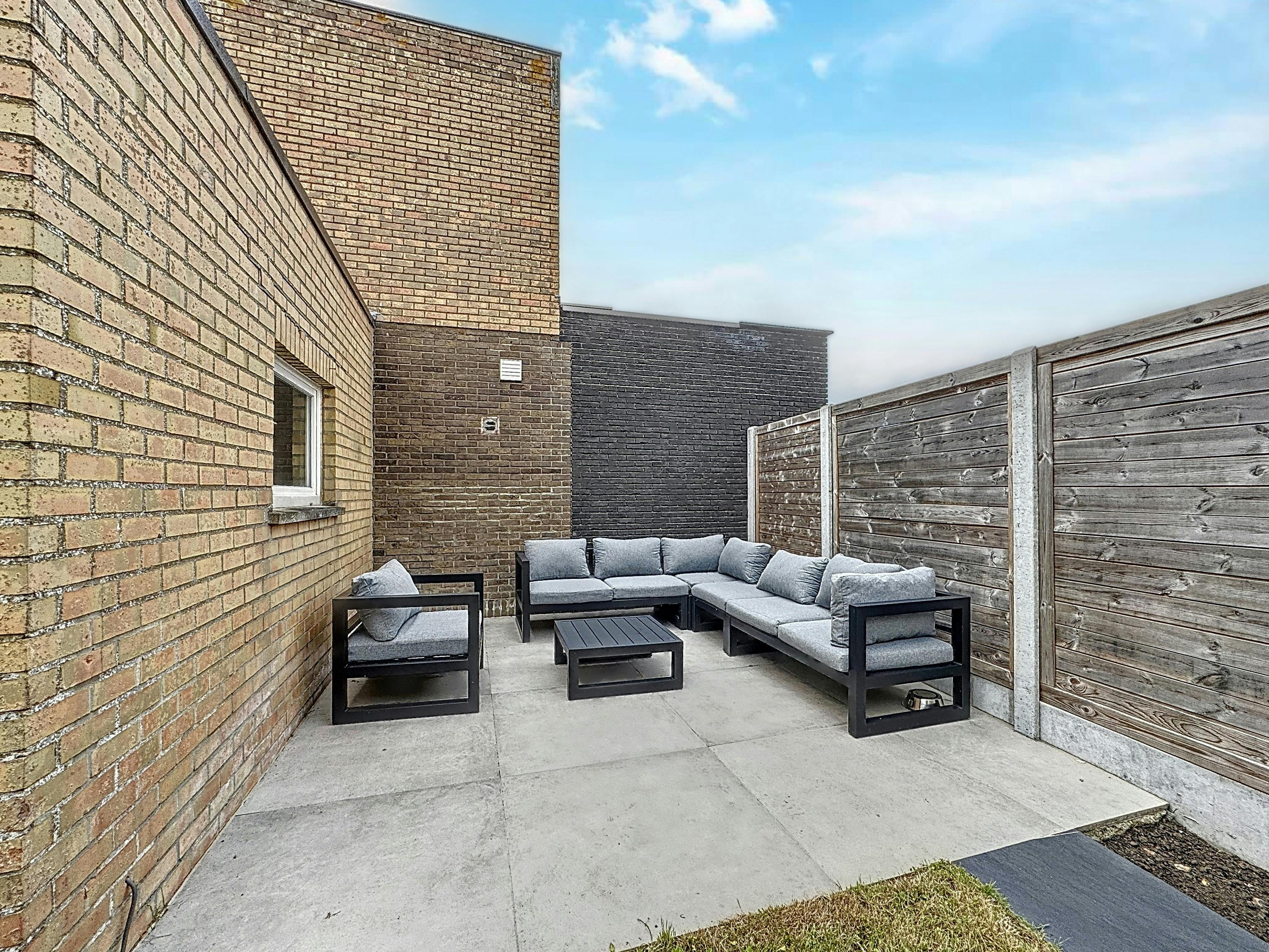 Lichtrijk en instapklaar huis met tuin te koop in Heist foto 4