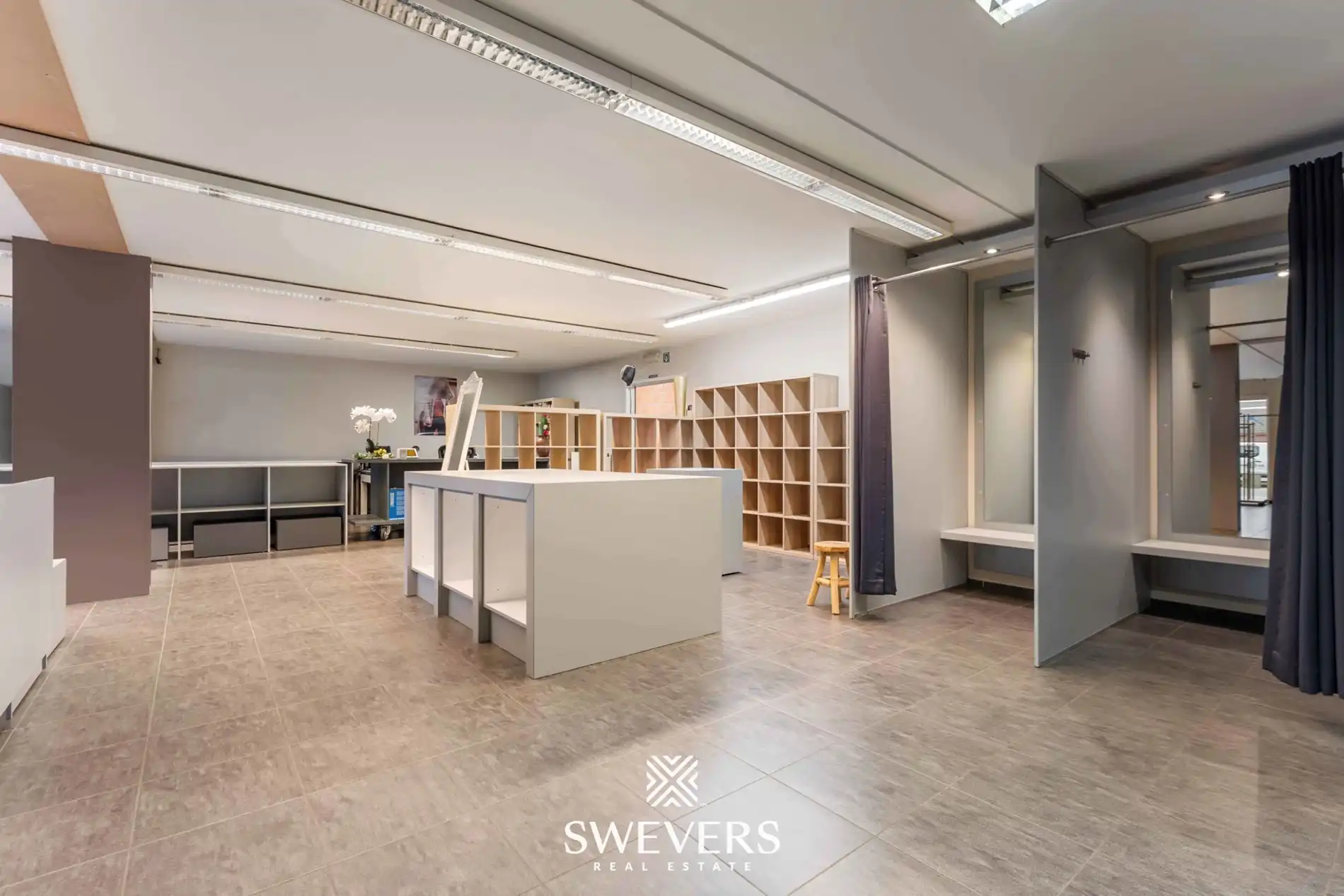 Opbrengsteigendom met handelspand, ruim appartement en uitbreidingspotentieel in hartje Heusden-Zolder foto 6