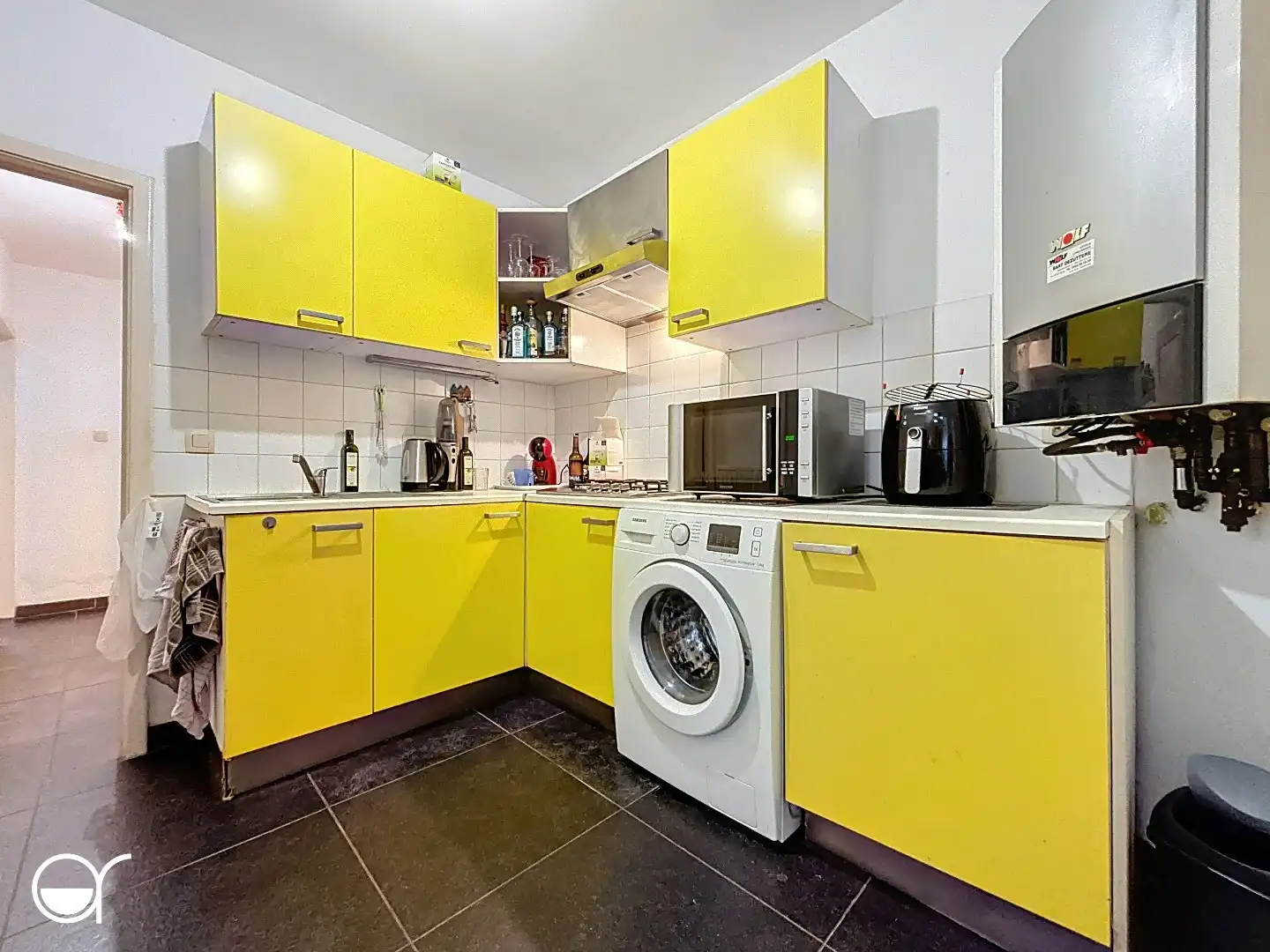 Gelijkvloers appartement met koer op gegeerde locatie foto 6