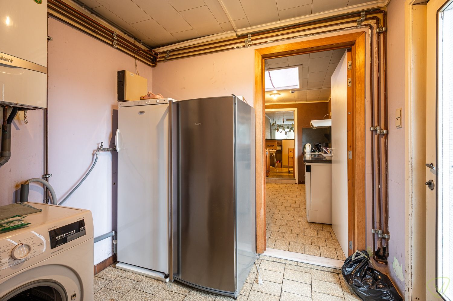 Statige handelswoning met ruime tuin in het centrum van Kaprijke foto 9