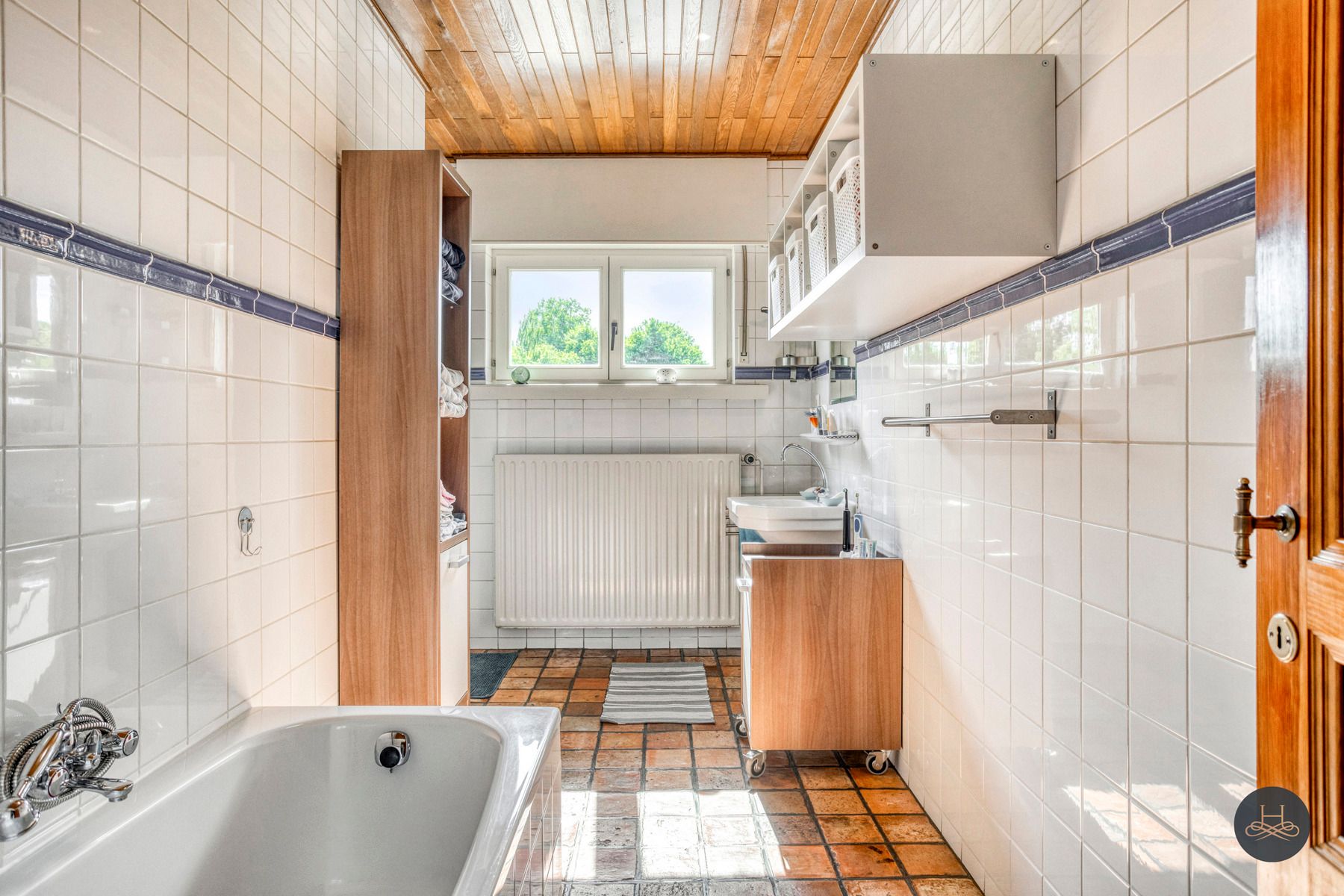Perfect onderhouden en ruime woning met prachtige ZW tuin foto 24