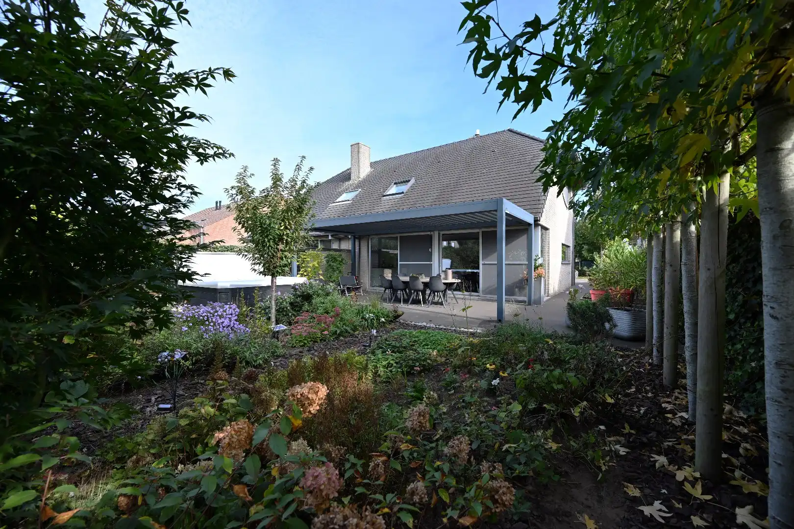Instapklare woning met 3 slpks, garage, tuin én zonneterras te Kluizen foto 2