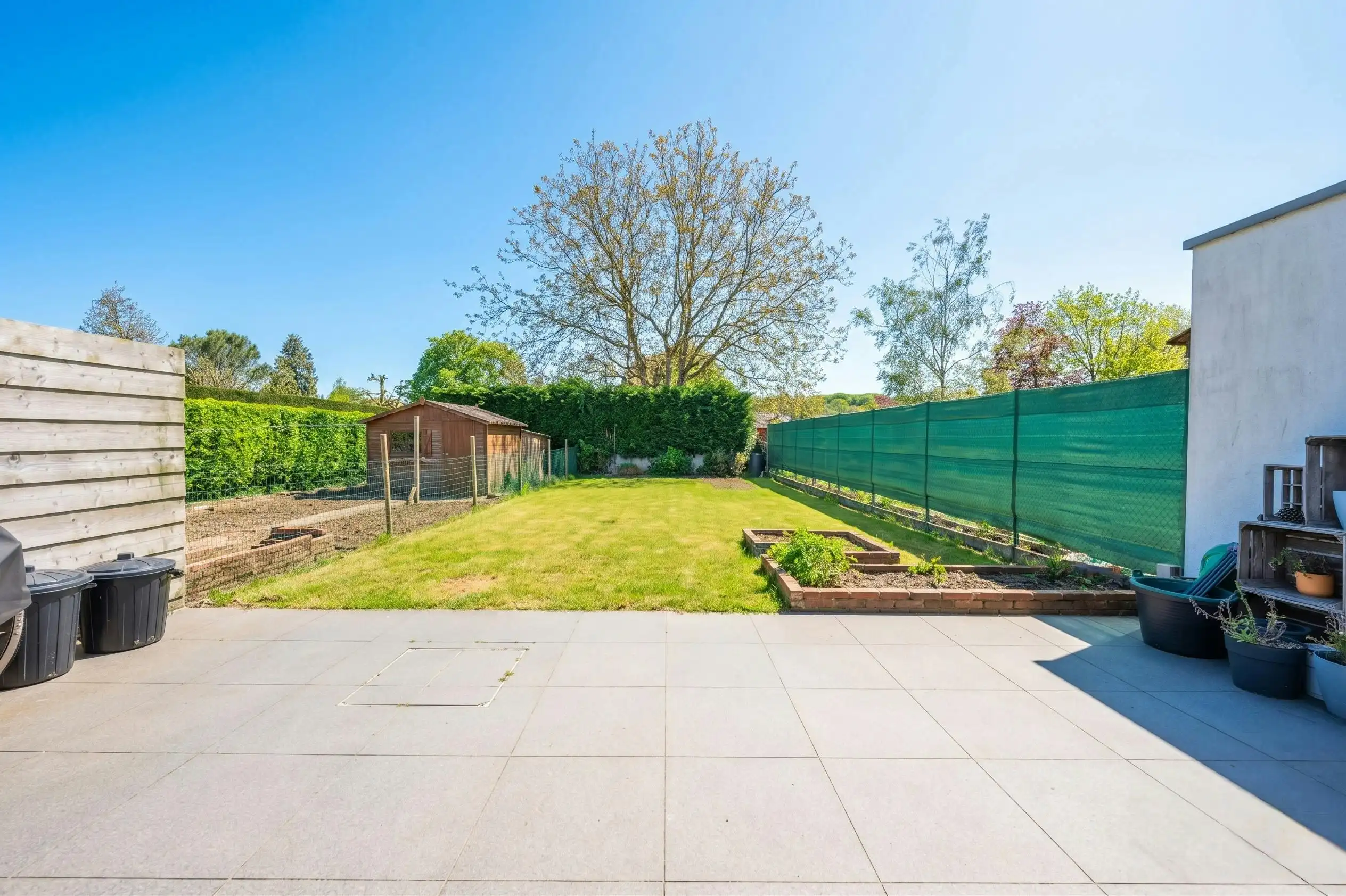 Instapklare halfopen bebouwing (2017) met zonovergoten tuin in Geluveld foto 14