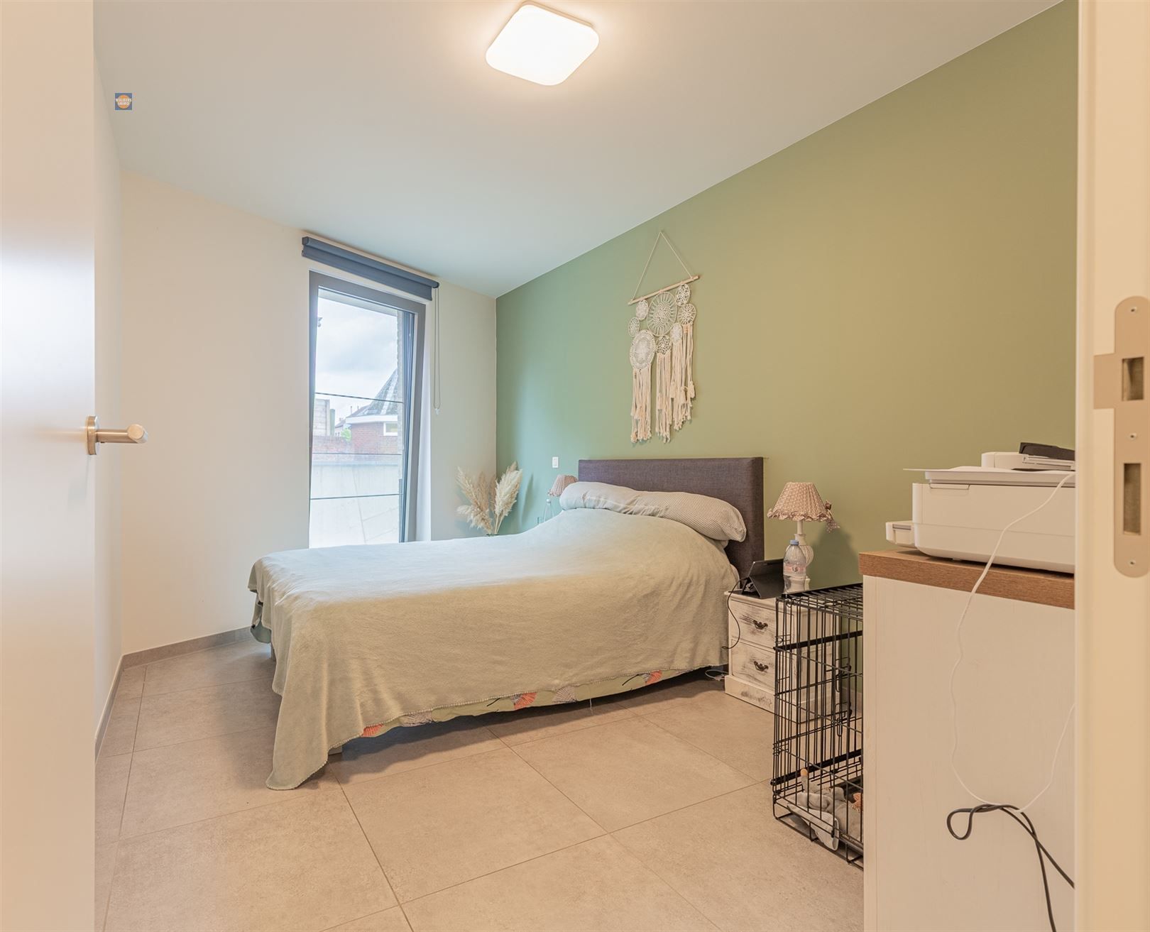 Instapklaar en energiezuinig gelijkvloersappartement met tuin en privé autostaanplaats foto 12