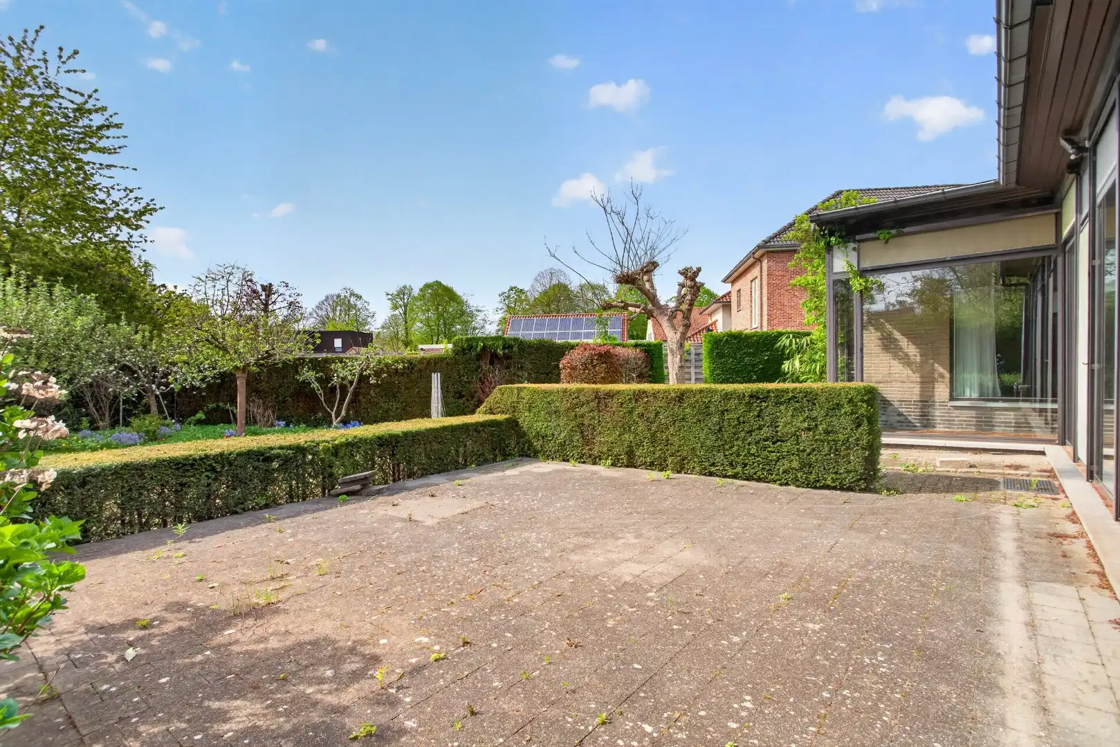 Ruime gelijkvloerse woning met veel potentieel op rustige ligging in Mol foto 40