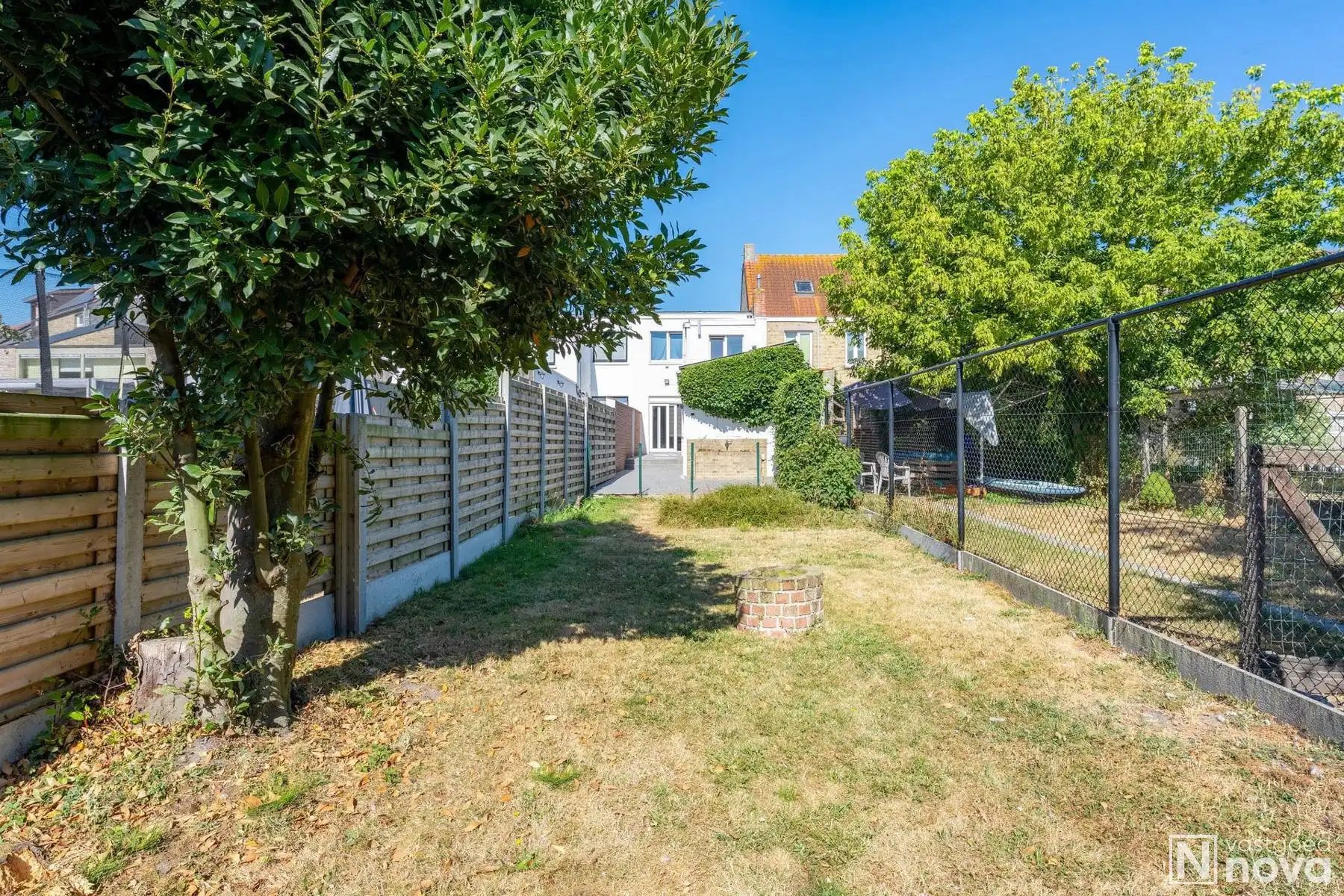 Centraal gelegen woning met 3 slaapkamers - zongerichte tuin foto 2