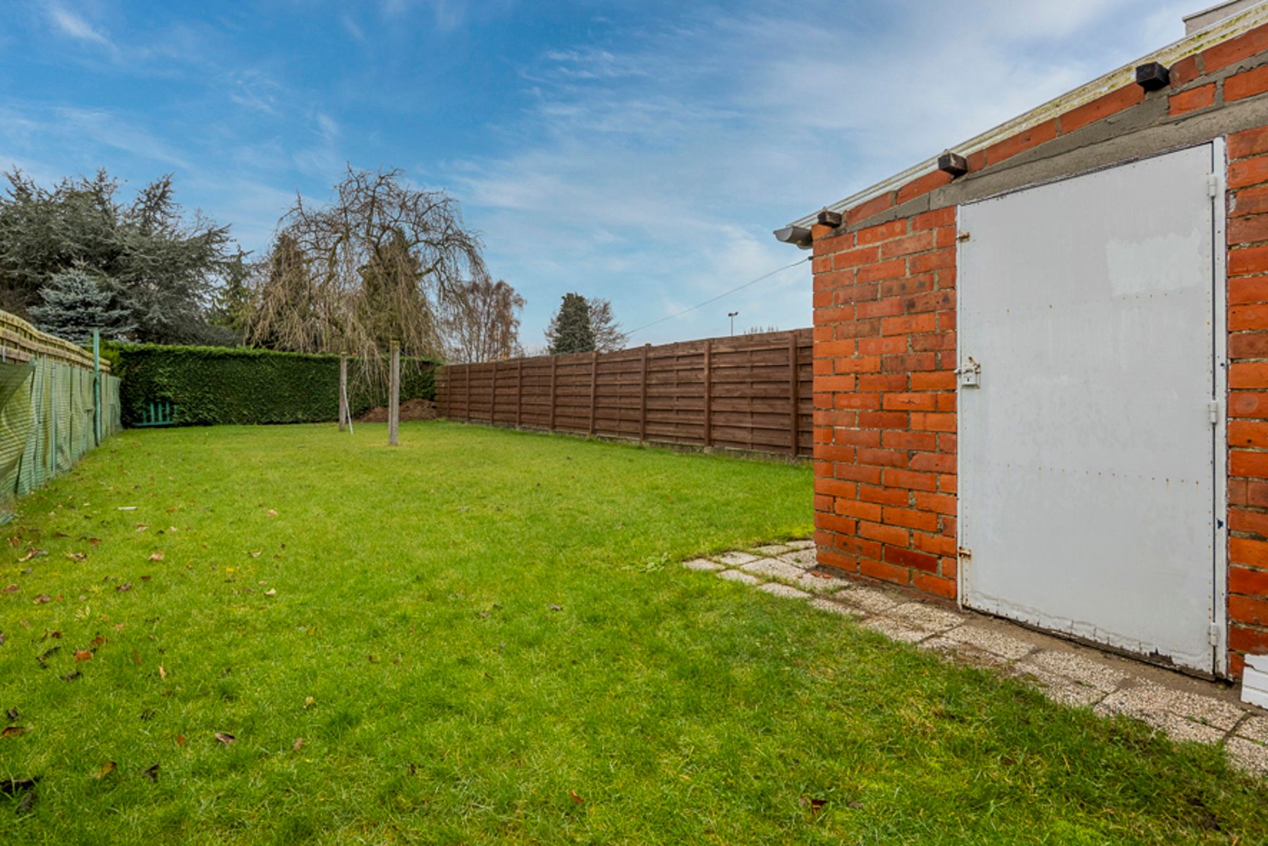 Halfopen bebouwing met 3 slpks, tuin en garage in Evergem foto 2