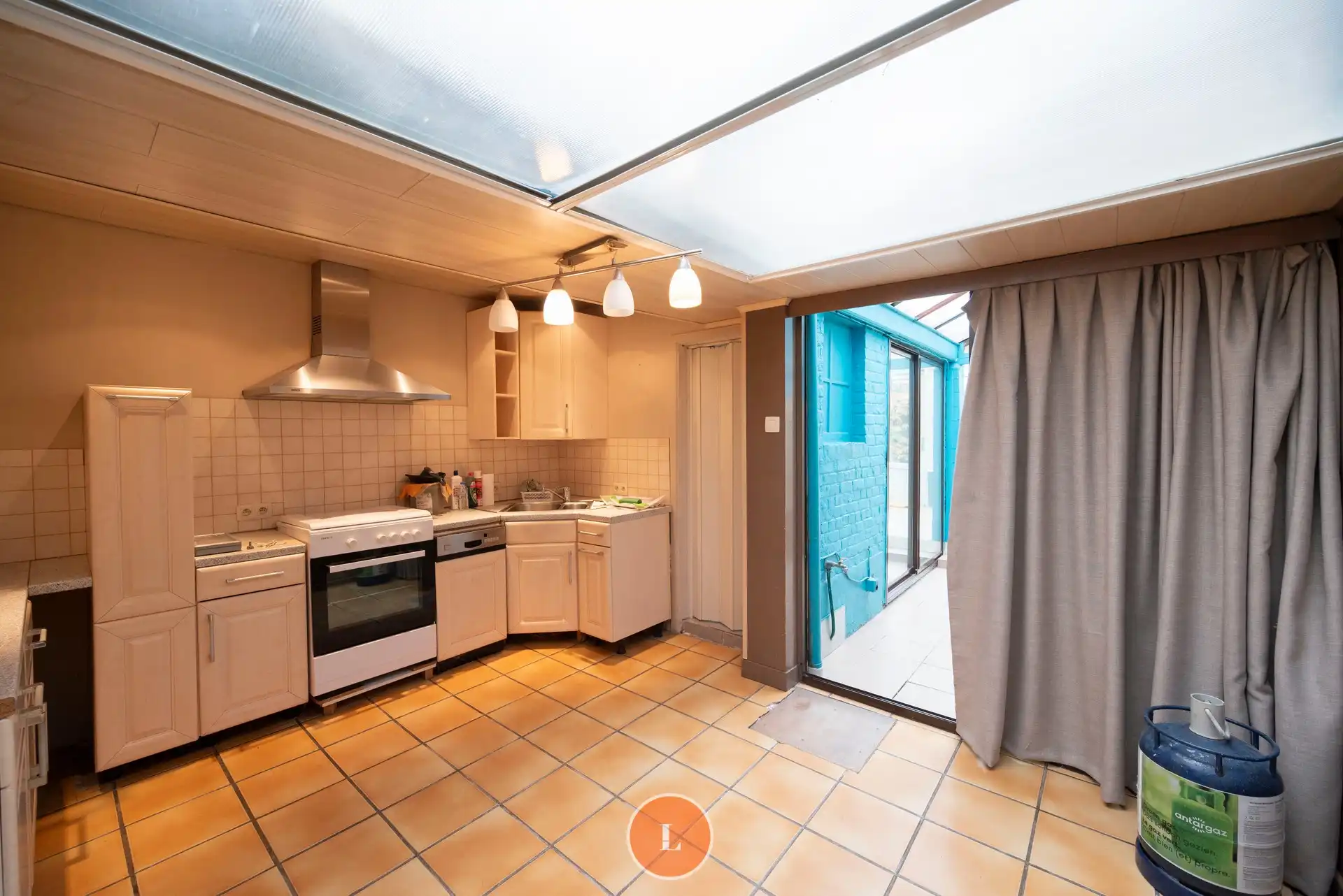 Te renoveren woning met veel potentieel en tuin in Menen foto 6