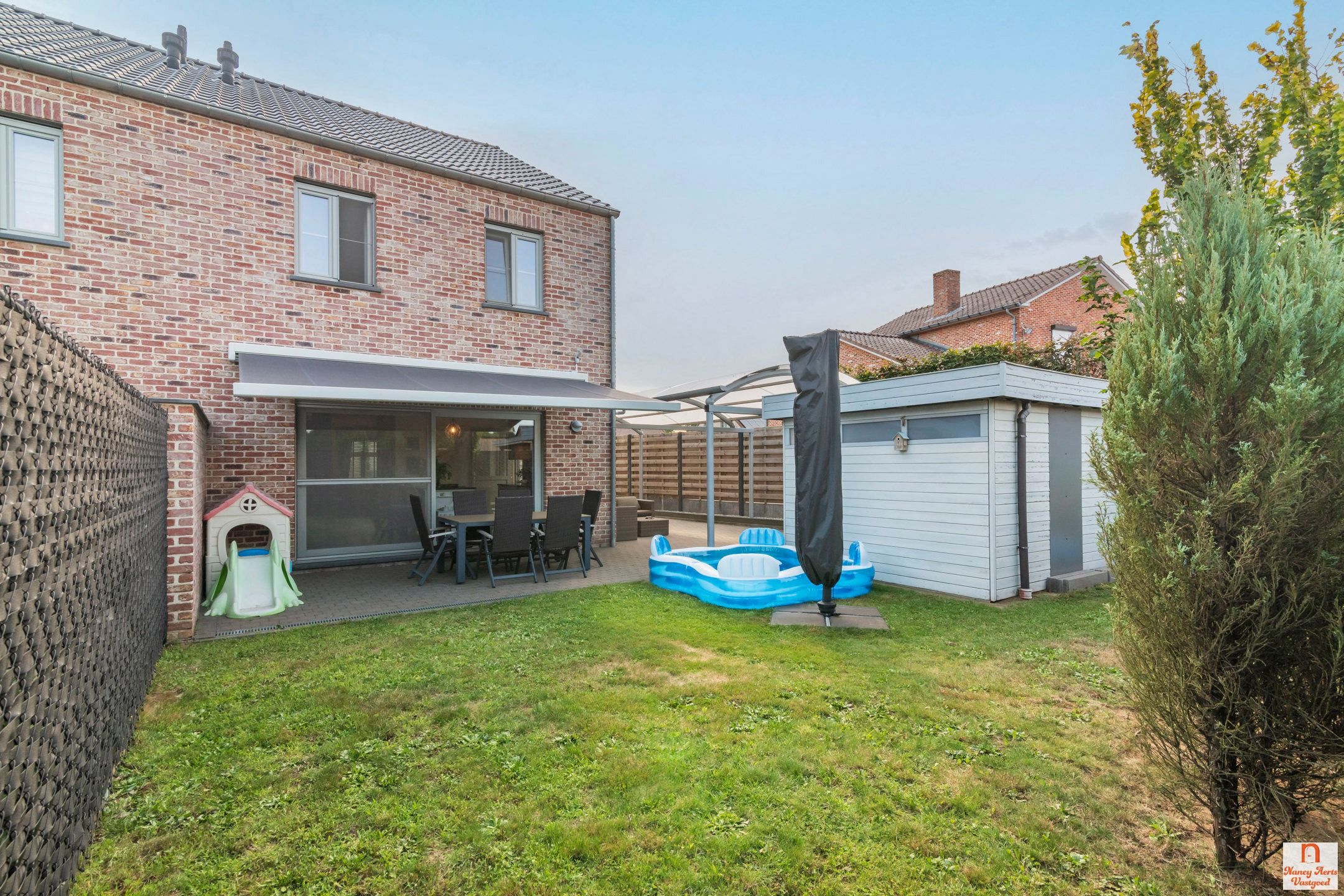 Gezinswoning met tuin en carport in rustige straat in Paal foto 4