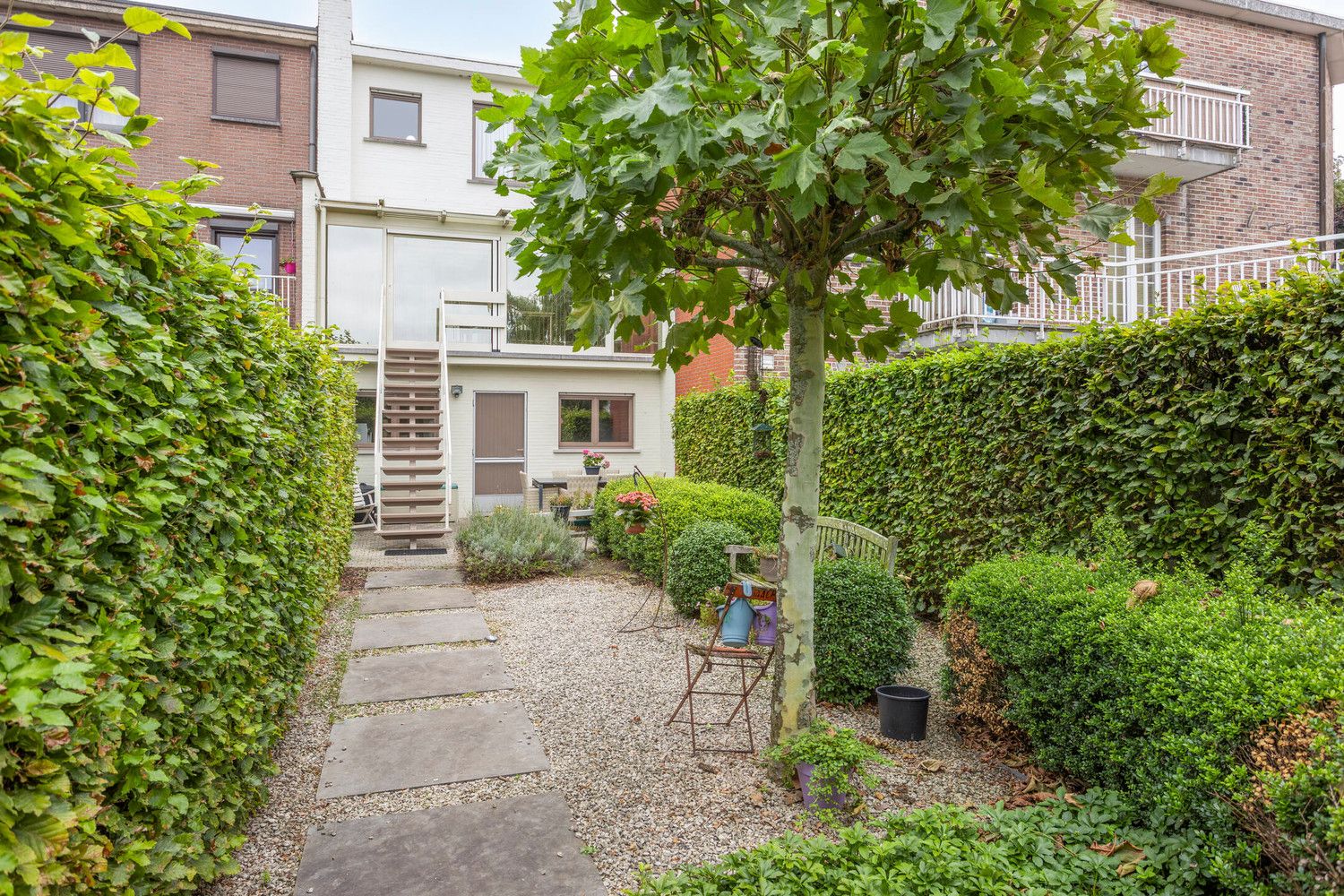 Mooie bel-étagewoning met 3 slks, garage, zomerkeuken en tuin! foto 41
