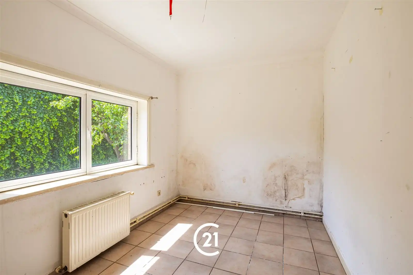 Te renoveren woning met tuin en garage in centrum Gent.  foto 18