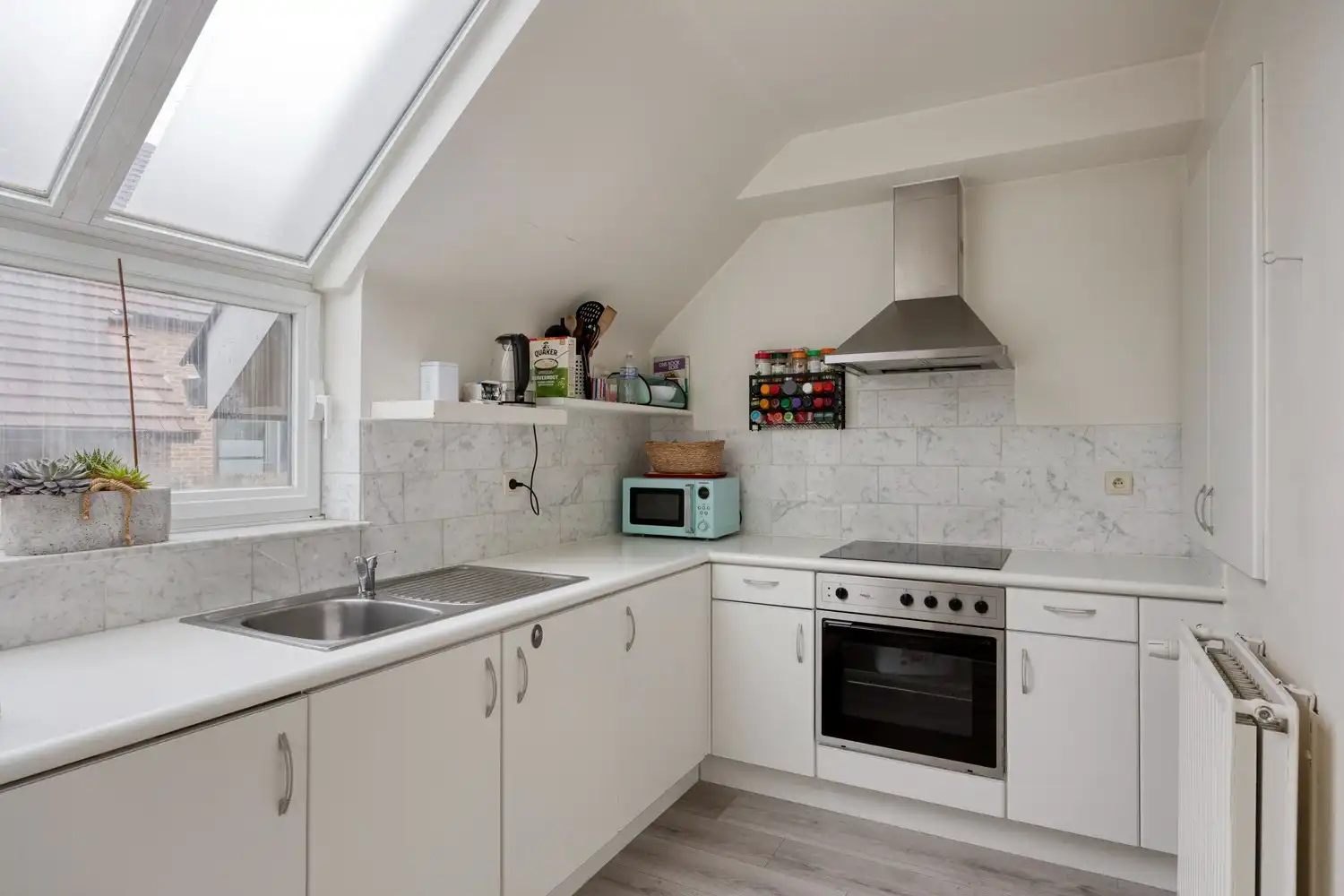 Instapklaar appartement met 2 slaapkamers en garage in het centrum van Lanaken! foto 14