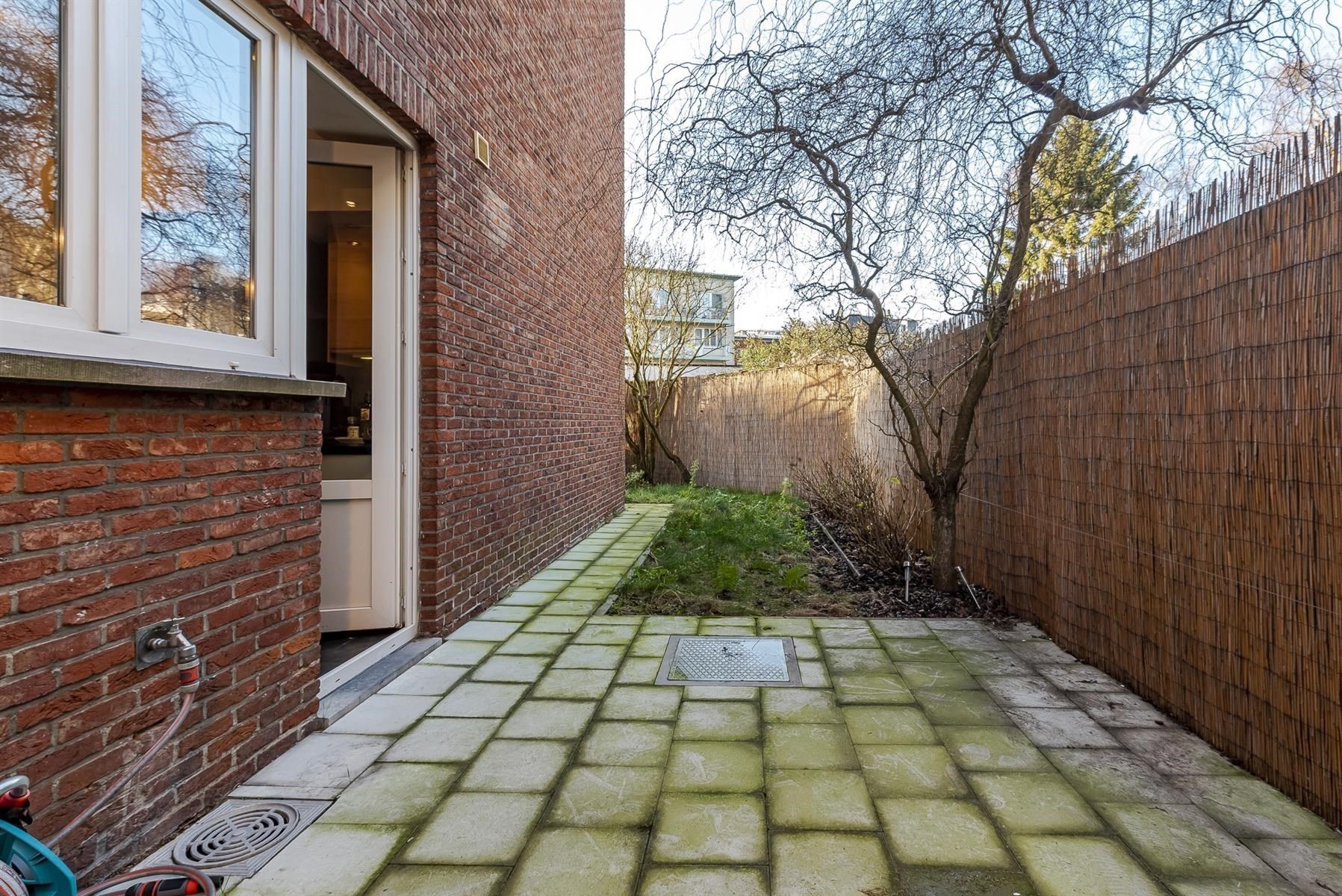 Gelijkvloers appartement met tuin foto 7