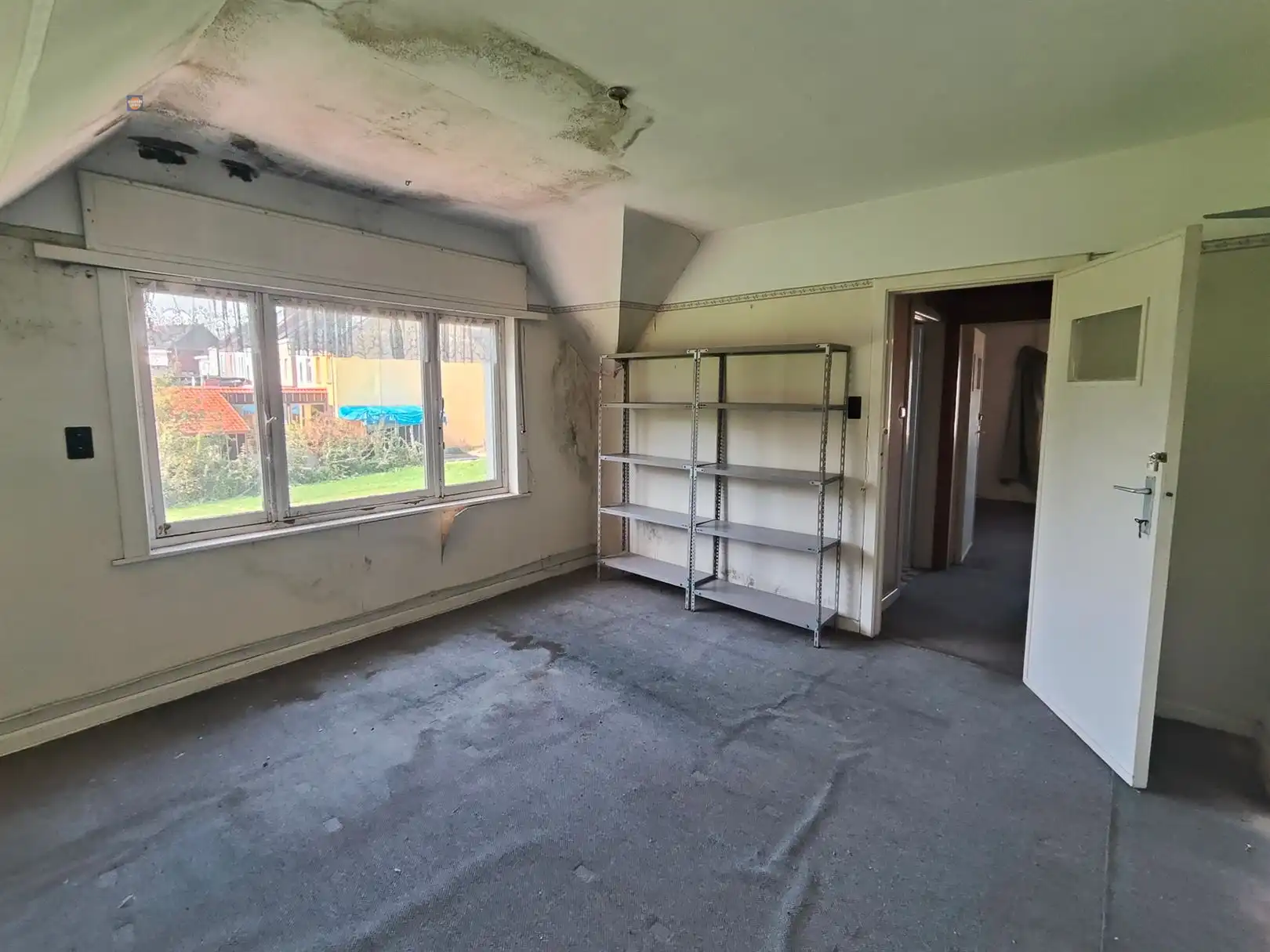 Karaktervolle te renoveren woning met 3 slaapkamers en tuin in Denderleeuw foto 12