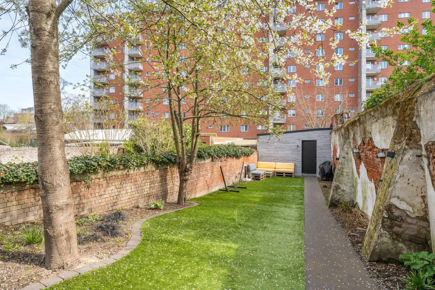 Gerenoveerde en energiezuinige woning met 4 slaapkamers en een tuin met een achteruitgang en een grote garage te centrum Leuven! foto 7