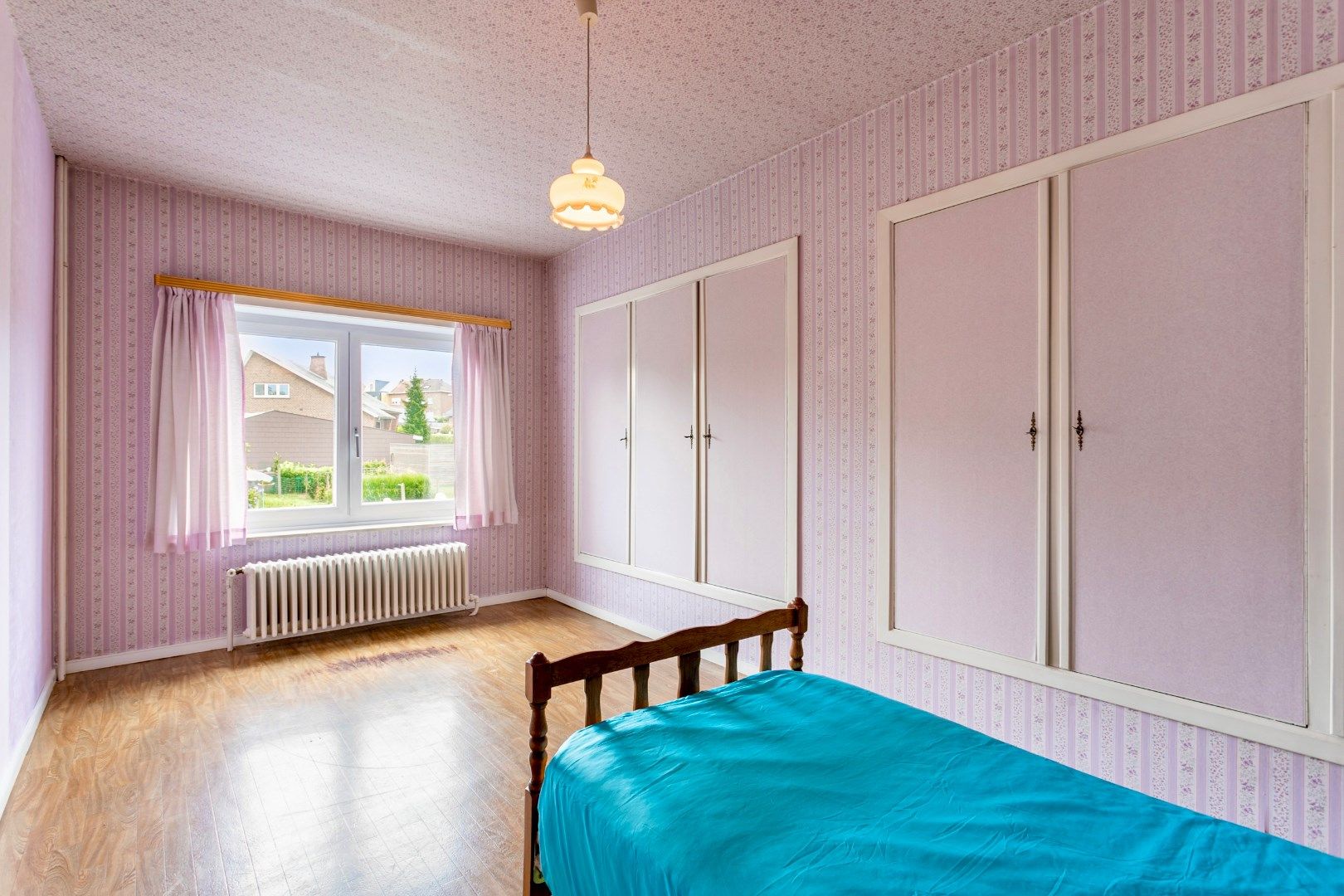 Woning met 2 (mogelijk 3) slpk. , tuin en inpandige garage foto 14